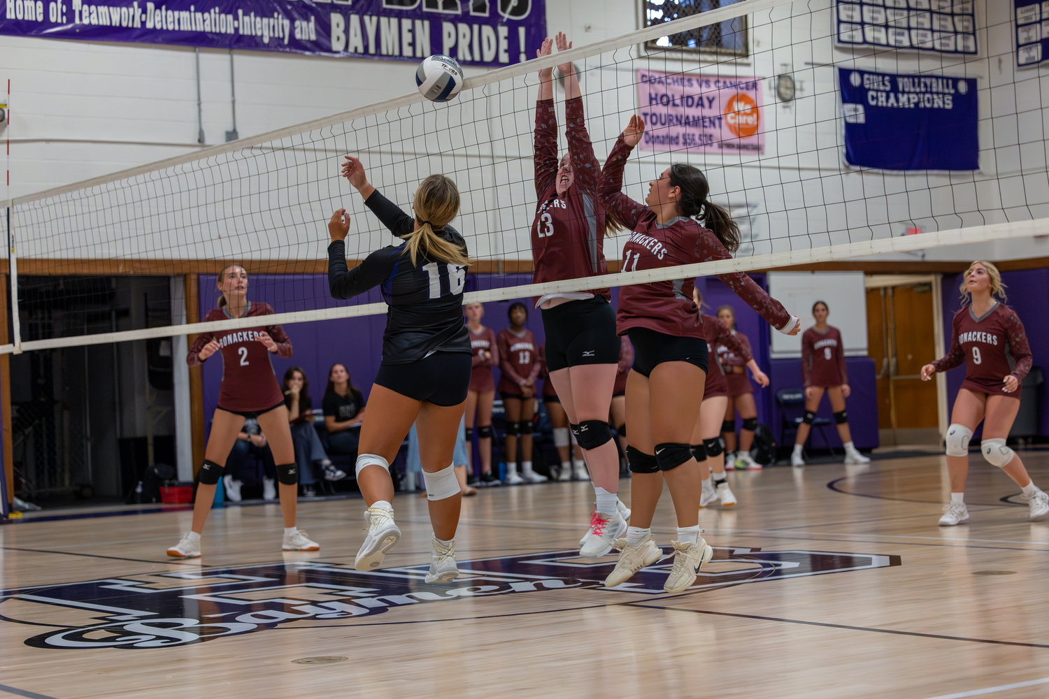 Susie DiSunno goes up for a block.  RON ESPOSITO