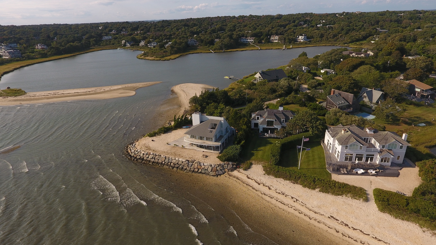 The Southampton Town Trustees have convinced New York State to allow Suffolk County to dredge sand from Far Pond and Middle Pond, at the northeastern end of Shinnecock Bay, and deposit the sand along the beach to the east where a stone revetment has caused extensive erosion and left the shoreline interrupted. MICHAEL WRIGHT