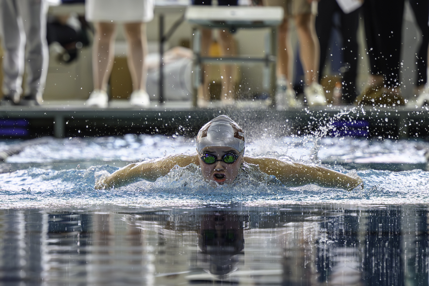 East Hampton sophomore Ginger Griffin competes in the 100-yard butterfly during the Suffolk County Championships last season. MARIANNE BARNETT