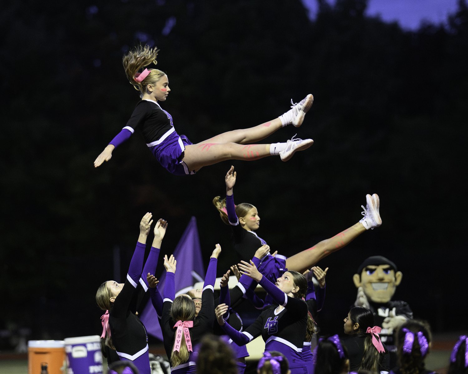 As part of its homecoming weekend, cheerleaders of all ages got to take part in Friday night's festivities.  MARIANNE BARNETT