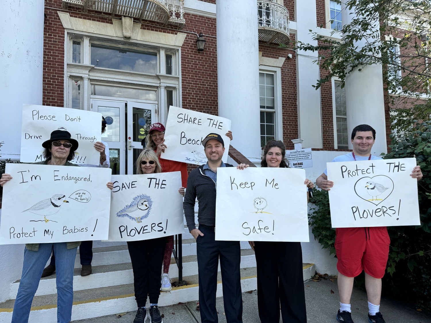 Wildlife advocates held a rally outside Southampton Town Hall on Monday, voicing support for stringent protections for piping plovers. MICHAEL WRIGHT