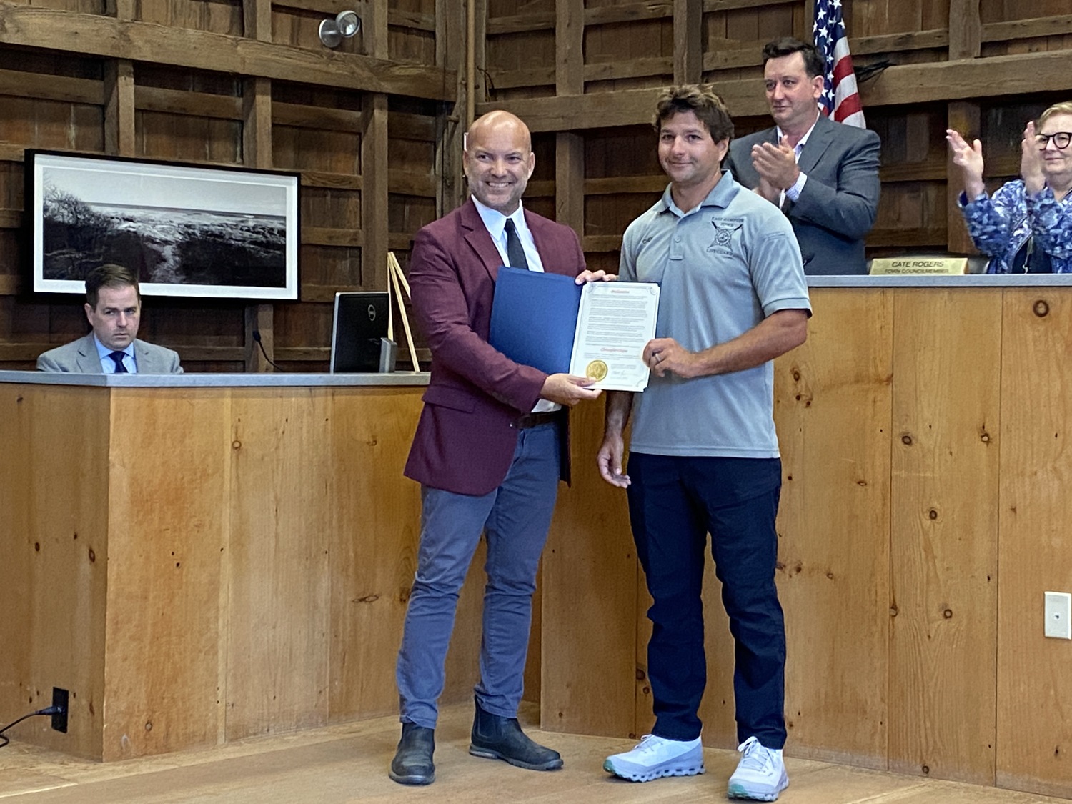 Councilman David Lys read a proclamation form the East Hampton Town Board congratulating Christopher Cinque for being named New York State Lifeguard of the Year. CHRISTOPHER WALSH