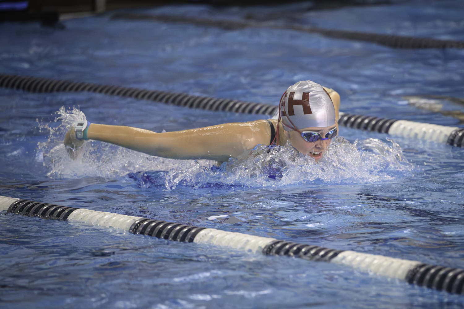 East Hampton junior Lizzy Daniels races in the 200-yard individual medley during the Suffolk County Championships last season. MARIANNE BARNETT