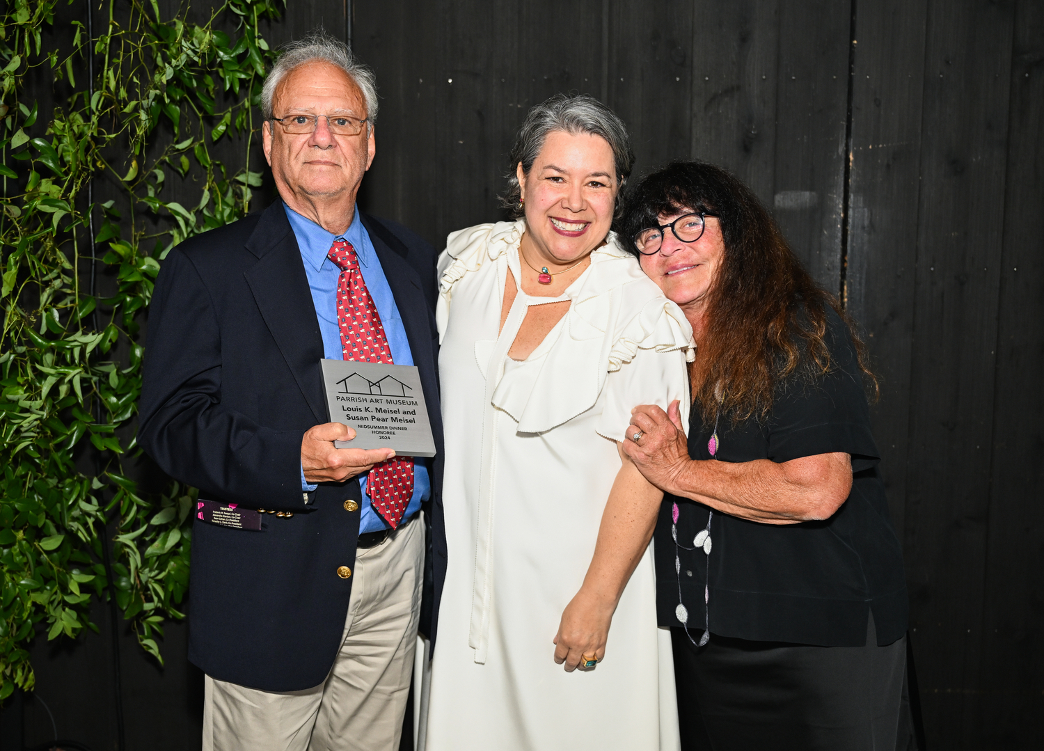 Louis K. Meisel, Dr. Mónica Ramírez-Montagut and Susan Meisel at the Parrish Art Museum gala in July. BFA/DAVID BENTHAL. COURTESY PARRISH ART MUSEUM