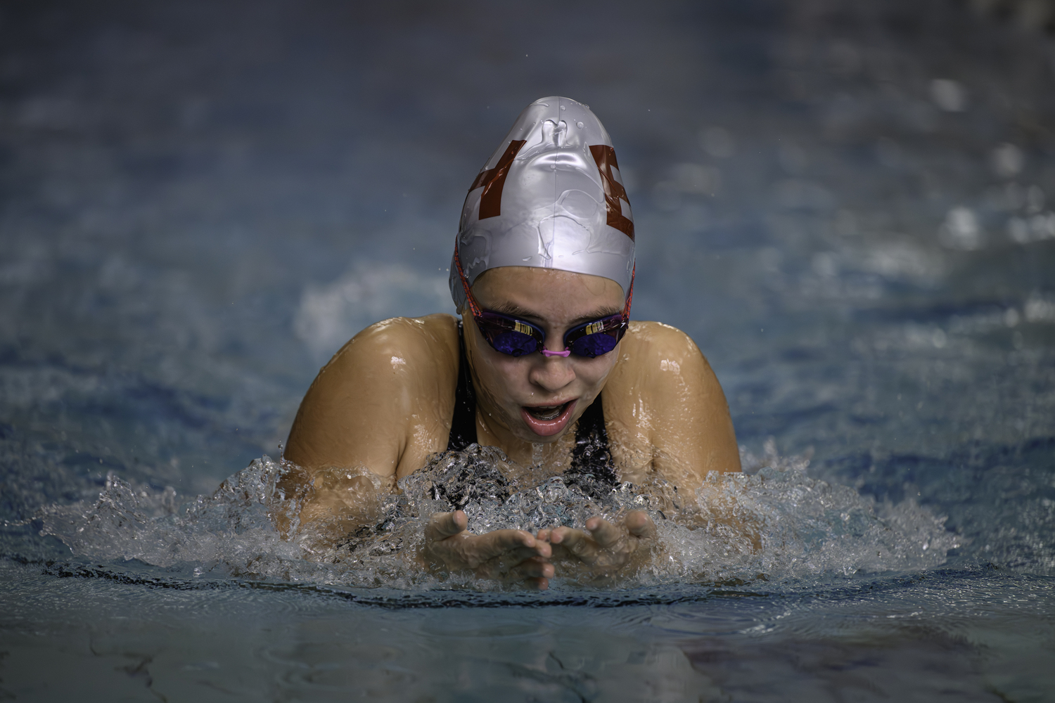 Pierson freshman Mia Luna races in the 100-yard breaststroke during the Suffolk County Championships last season. MARIANNE BARNETT