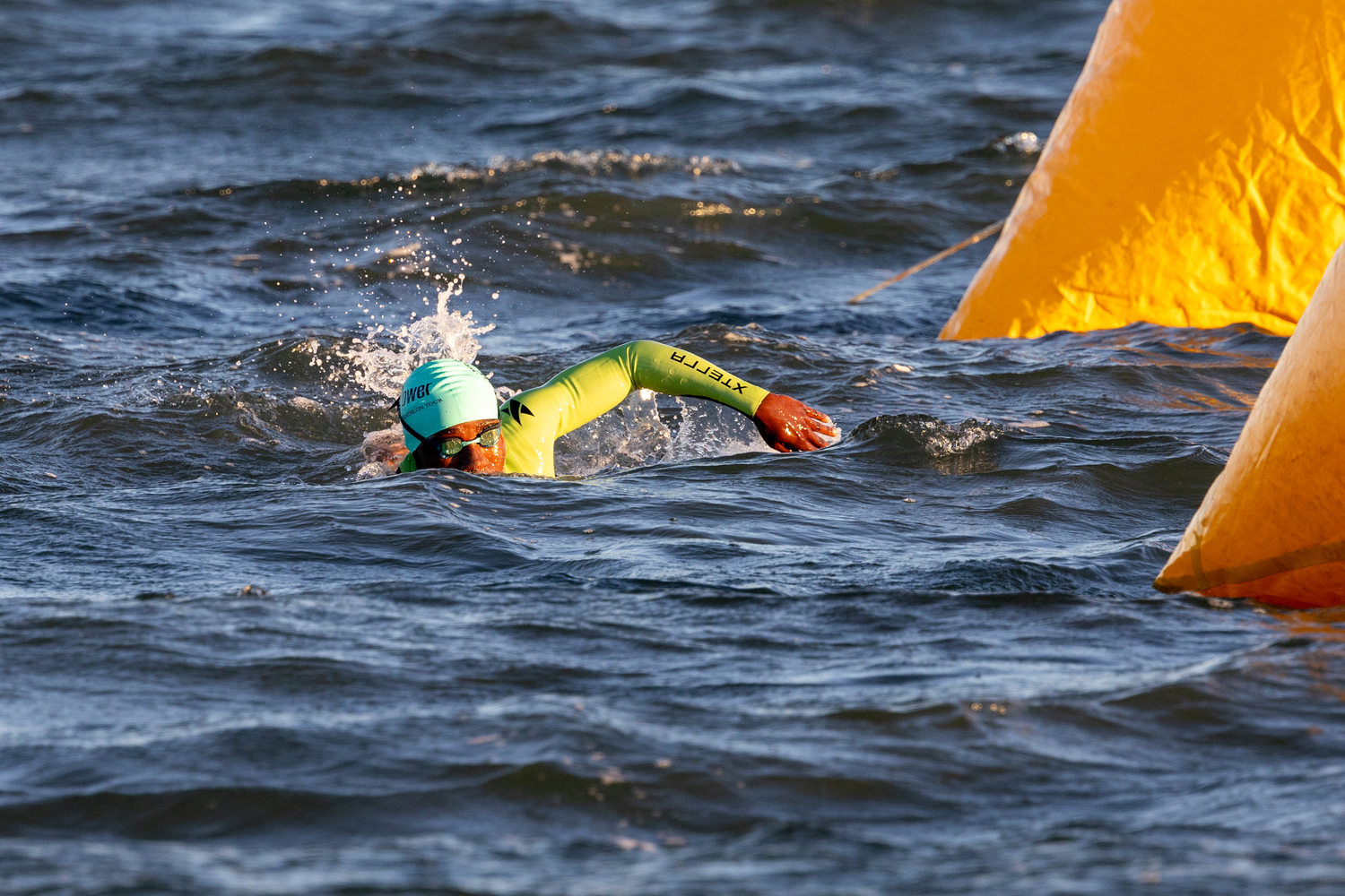 A triathlete in the water at Long Beach.   RON ESPOSITO