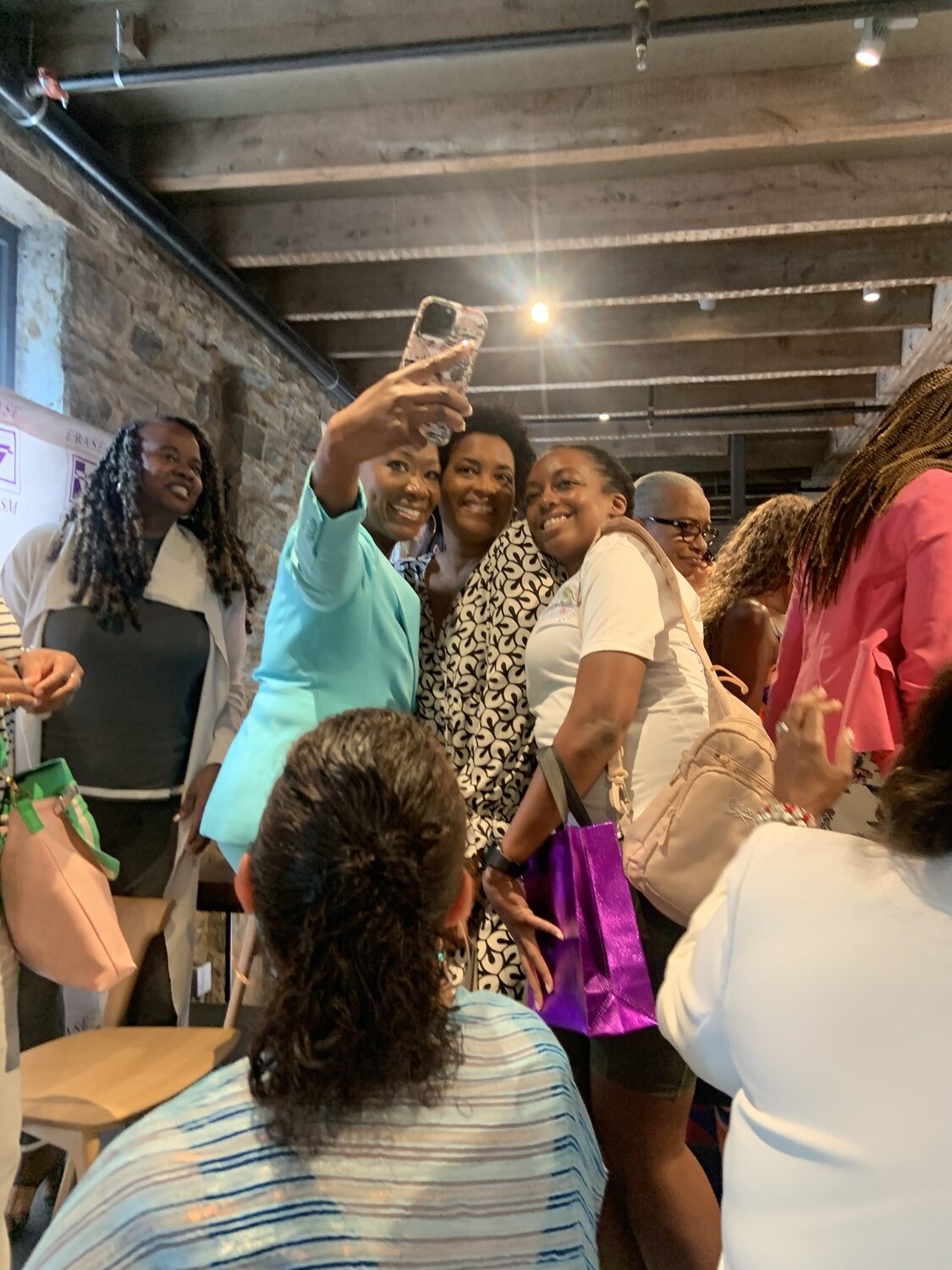 Joy-Ann Reid poses for a selfie after her presentation with Maya Wiley at The Church in Sag Harbor. STEPHEN J. KOTZ