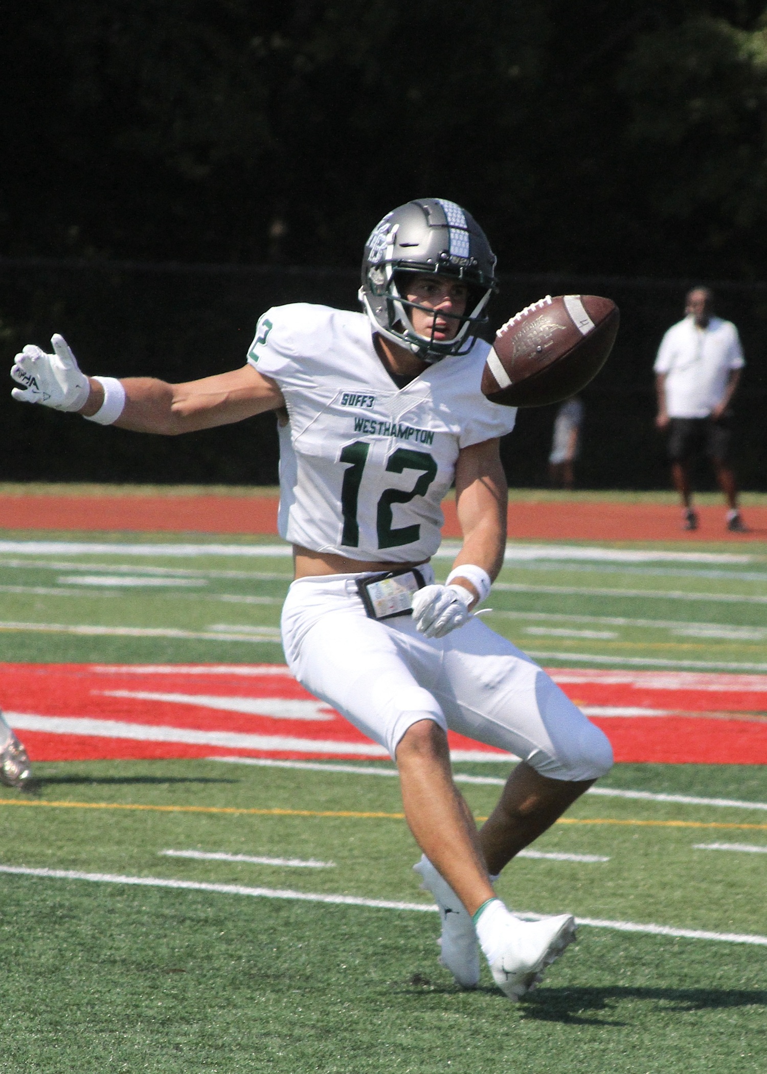 Senior running back Brody Schaffer keeps his eyes on the ball. DESIRÉE KEEGAN