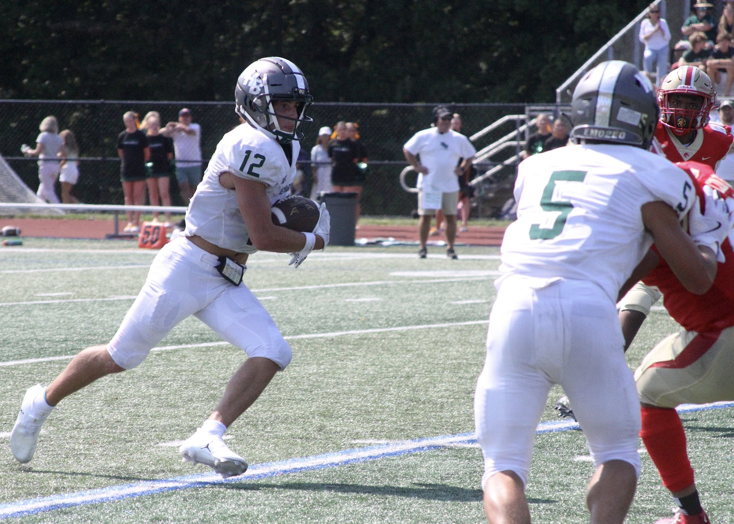 Senior running back Brody Schaffer moves the ball downfield. DESIRÉE KEEGAN