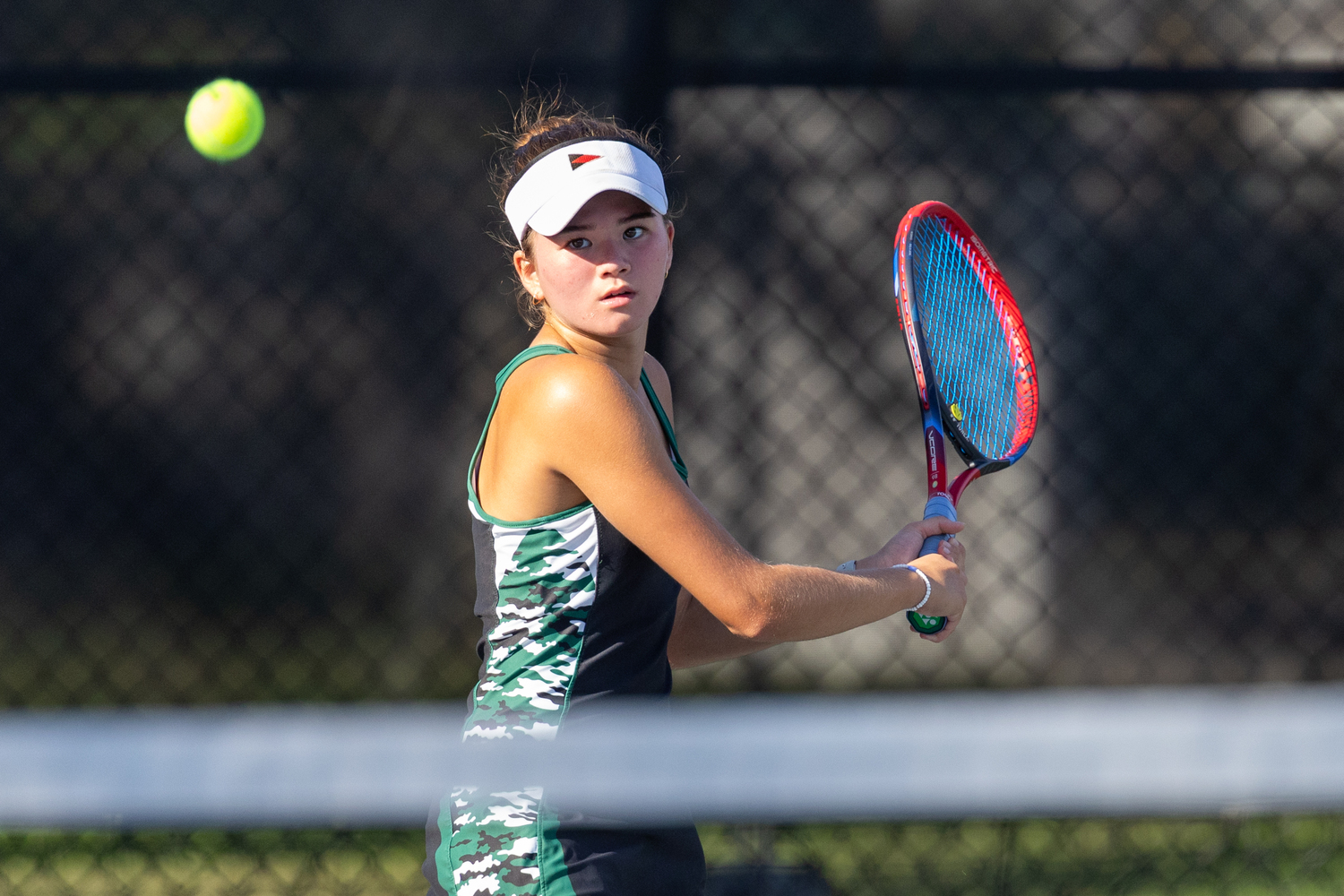 Junior Diana Elliott keeps her eyes on the ball. RON ESPOSITO