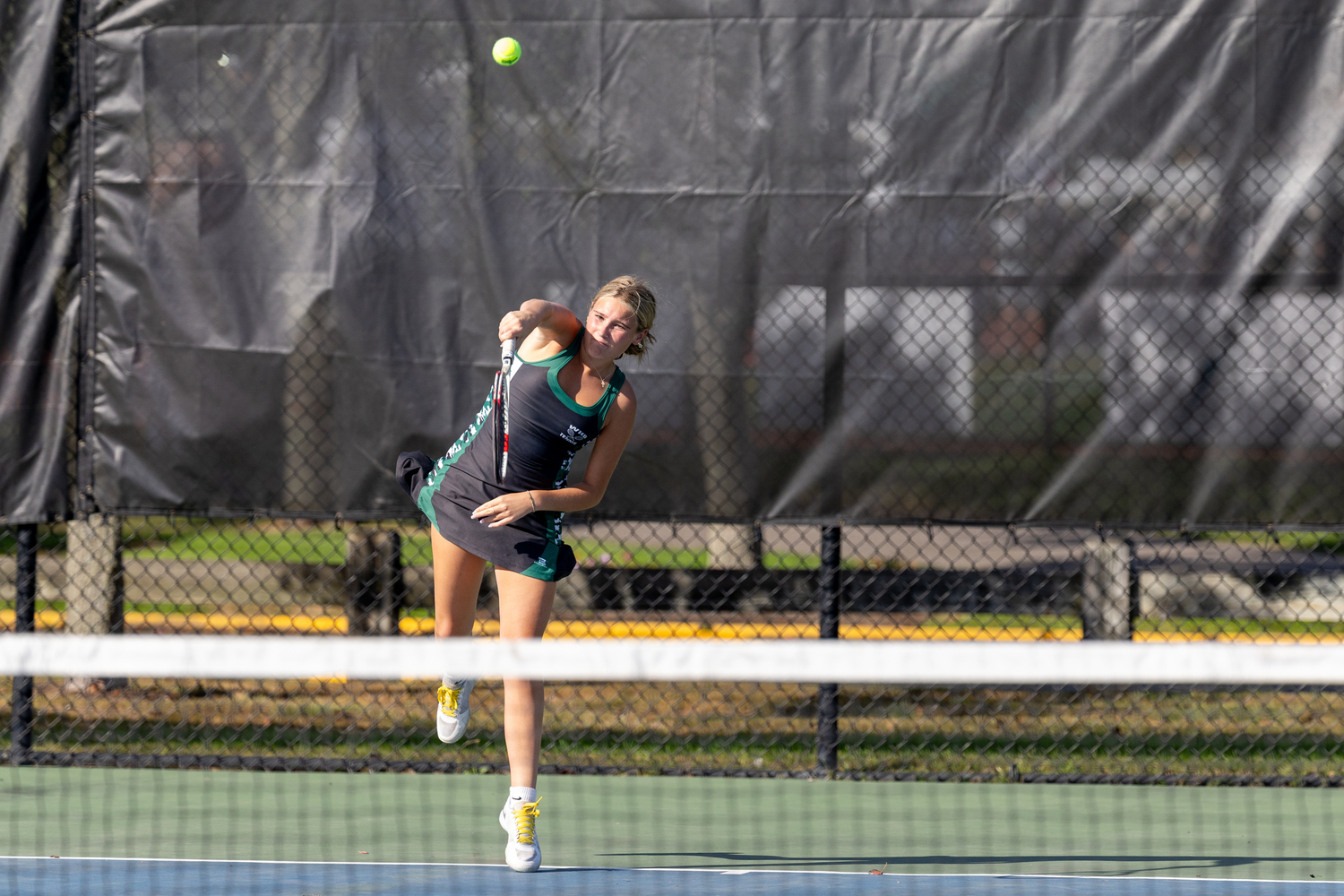 Senior Shannon Killoran serves. RON ESPOSITO