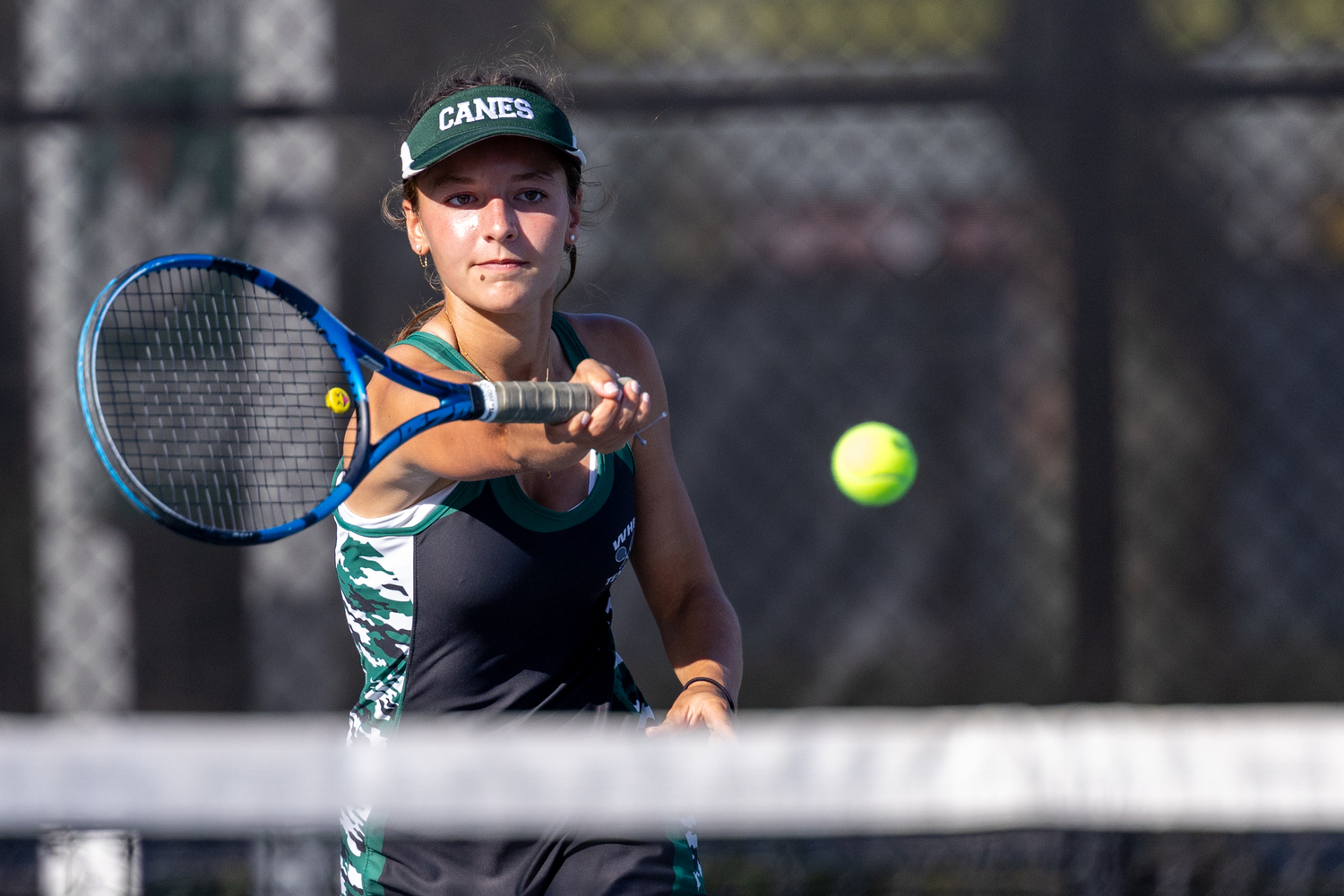 Sophomore Zoe Grellet-Aumont returns the ball. RON ESPOSITO