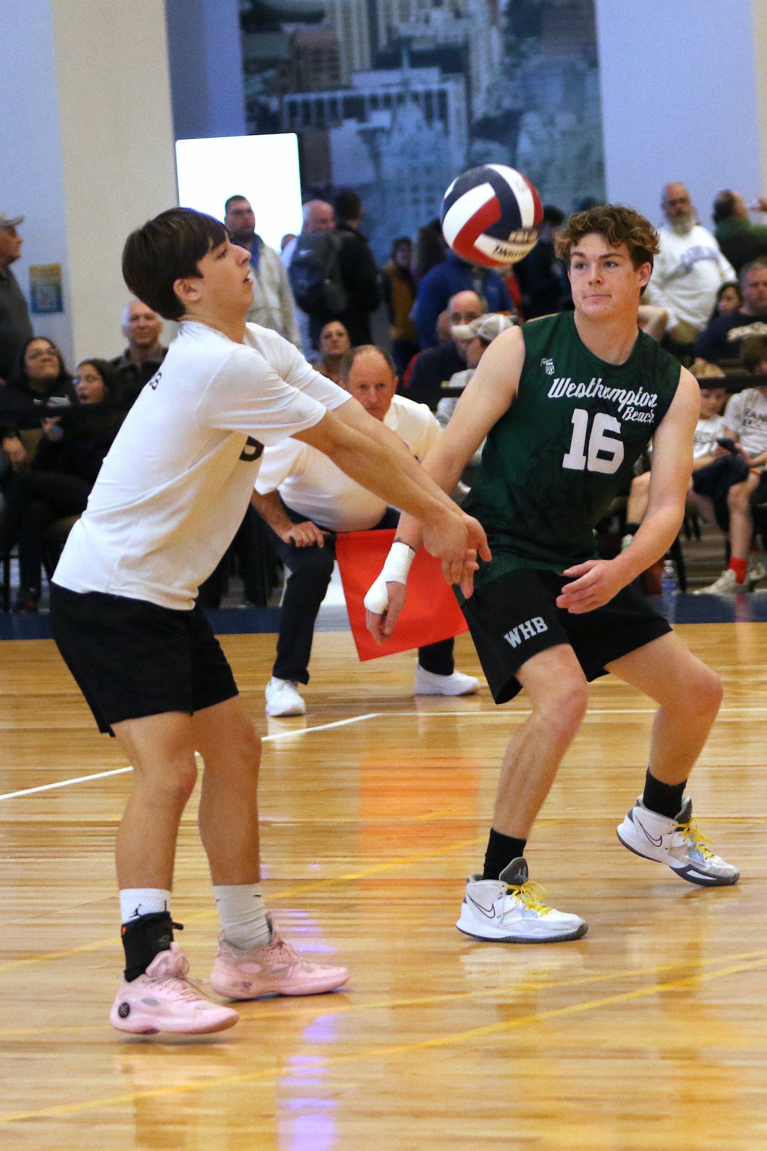 Senior libero Aaron Kiefer returns a serve during the state boys volleyball tournament last year. MARK DEBORTOLI