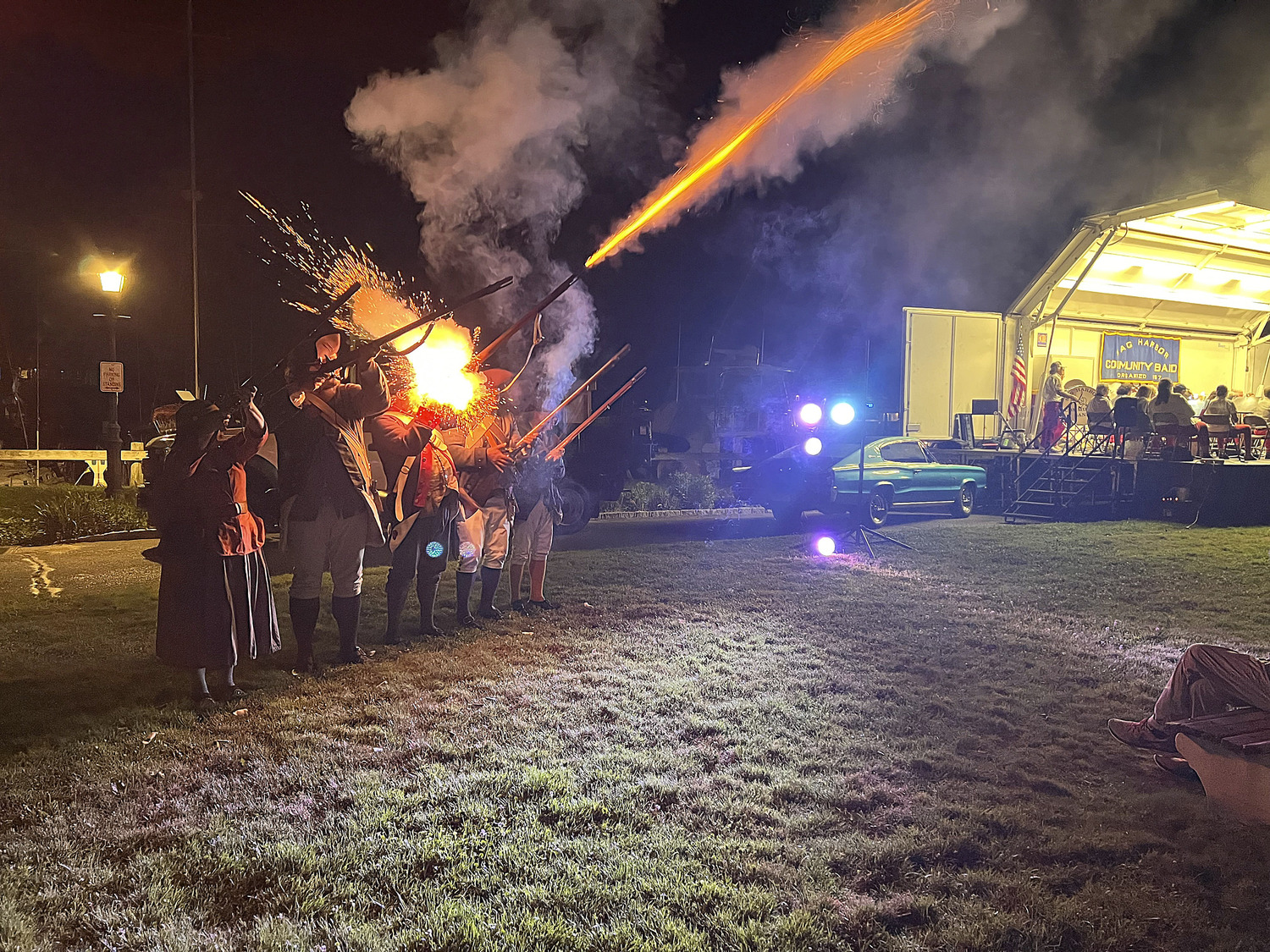 The Sag Harbor Community Band ended it's 66th summer season with a bang on August 27 in Marine Park with the help of  the Third NY Regiment, who provided the musket fire, during Tchaikovsky’s 1812 Overture.   DANA SHAW