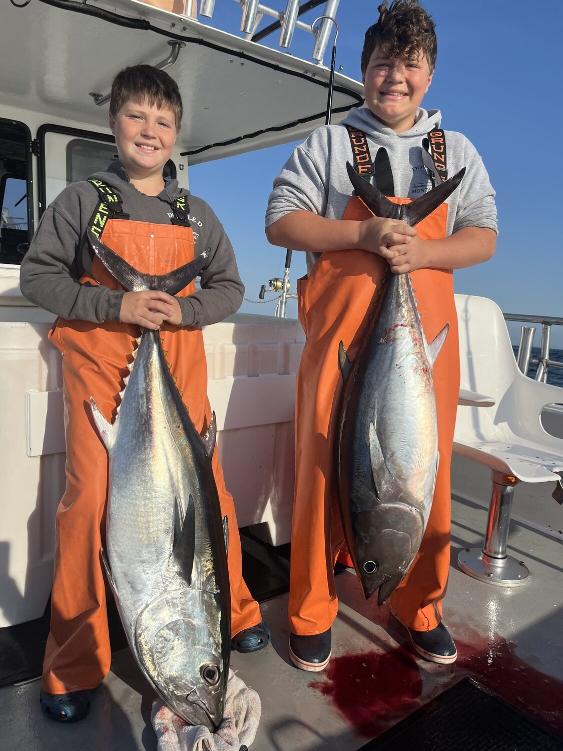 Adam and Jake Giunta had a family fun day with the bluefin tunas aboard their dad's charter boat Double D out of Montauk. CAPT. DAN GIUNTA