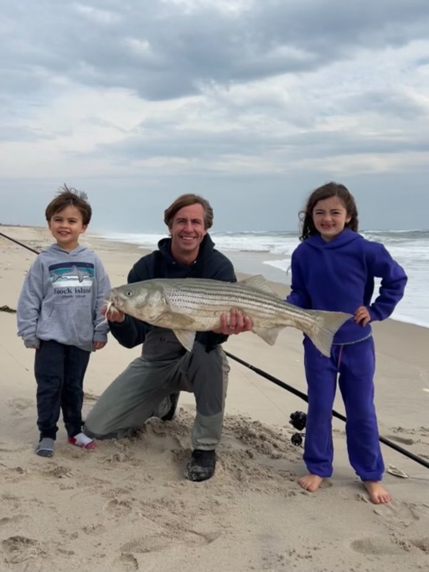 Chris Moscicki got to show off a bit for his kids with this nice striped bass he pulled from the local surf recently.