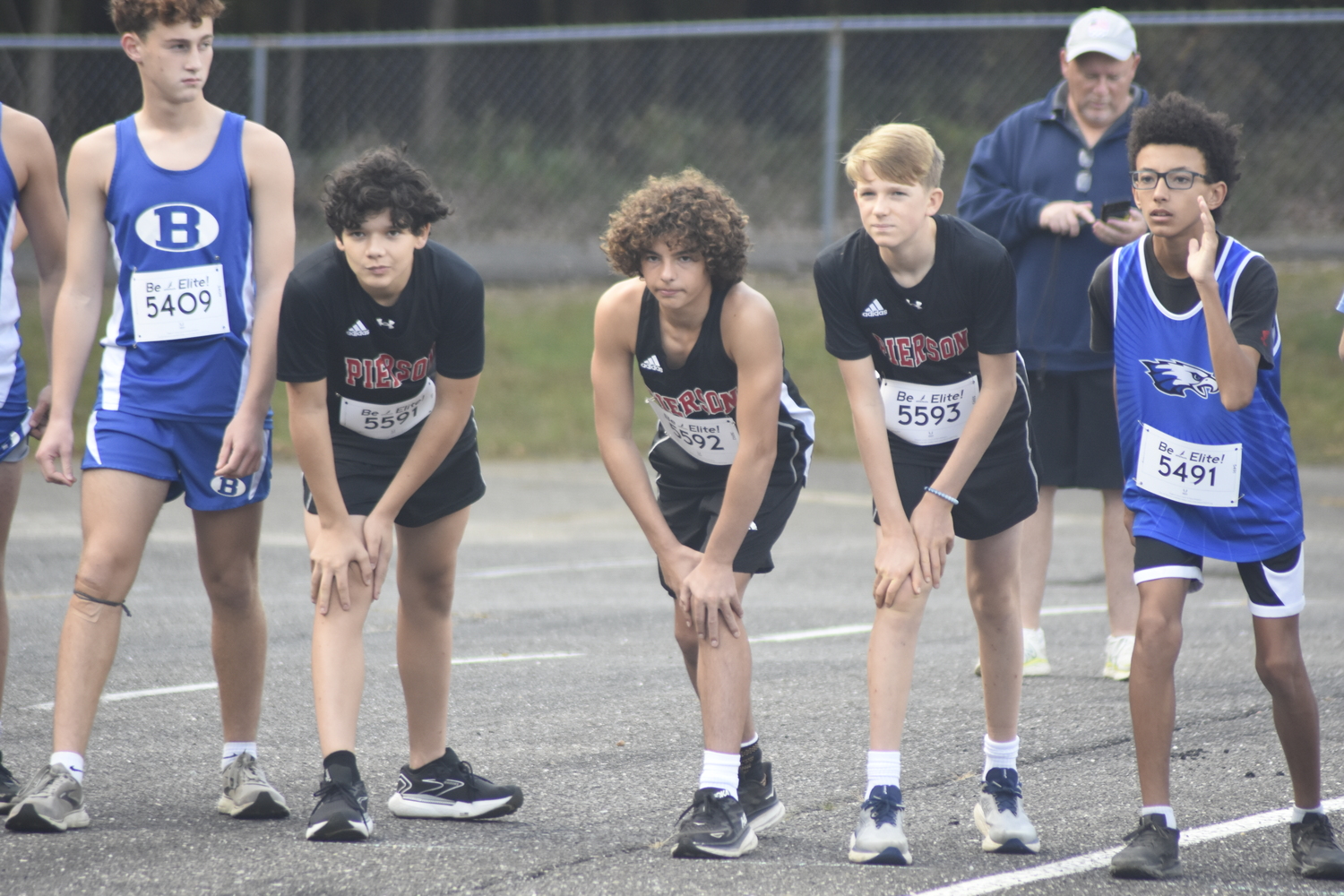 Pierson freshmen, from left, Jackson Araya-Duran, Ben Ezeir and Lincoln Fischer at the start of the freshman race of the Tom Knipfing Invitational on Saturday morning.   DREW BUDD