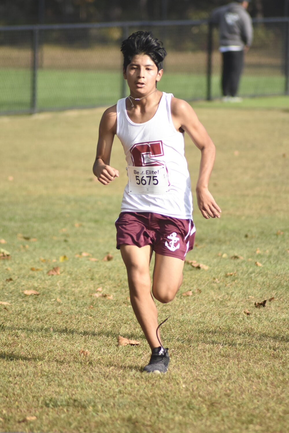 Southampton's Christopher Guaman crosses the finish line in the freshman race on Saturday.  DREW BUDD