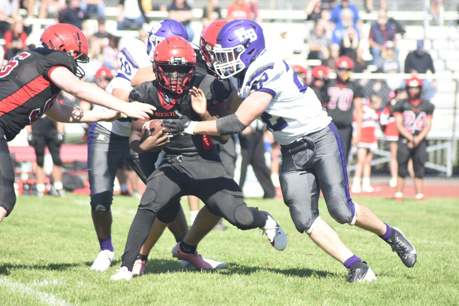 Josh Reyes and Nate Donahue bottle up the Center Moriches offense.   DREW BUDD