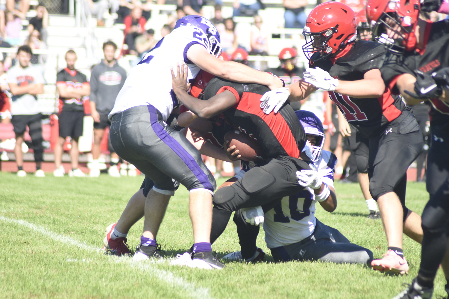 Josh Reyes and Nate Donahue bottle up the Center Moriches offense.   DREW BUDD