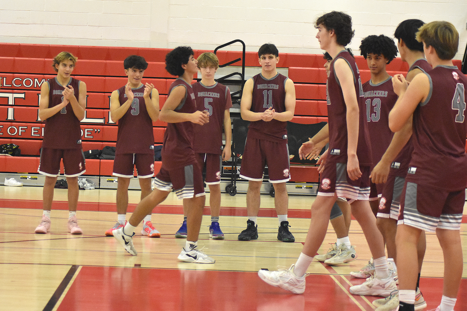 The Bonackers are introduced just prior to their playoff match at East Islip.   DREW BUDD