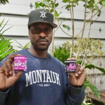 Brown Buddha New York co-owner Marq Hayes with a Bridgehampton-grown marijuana known as 