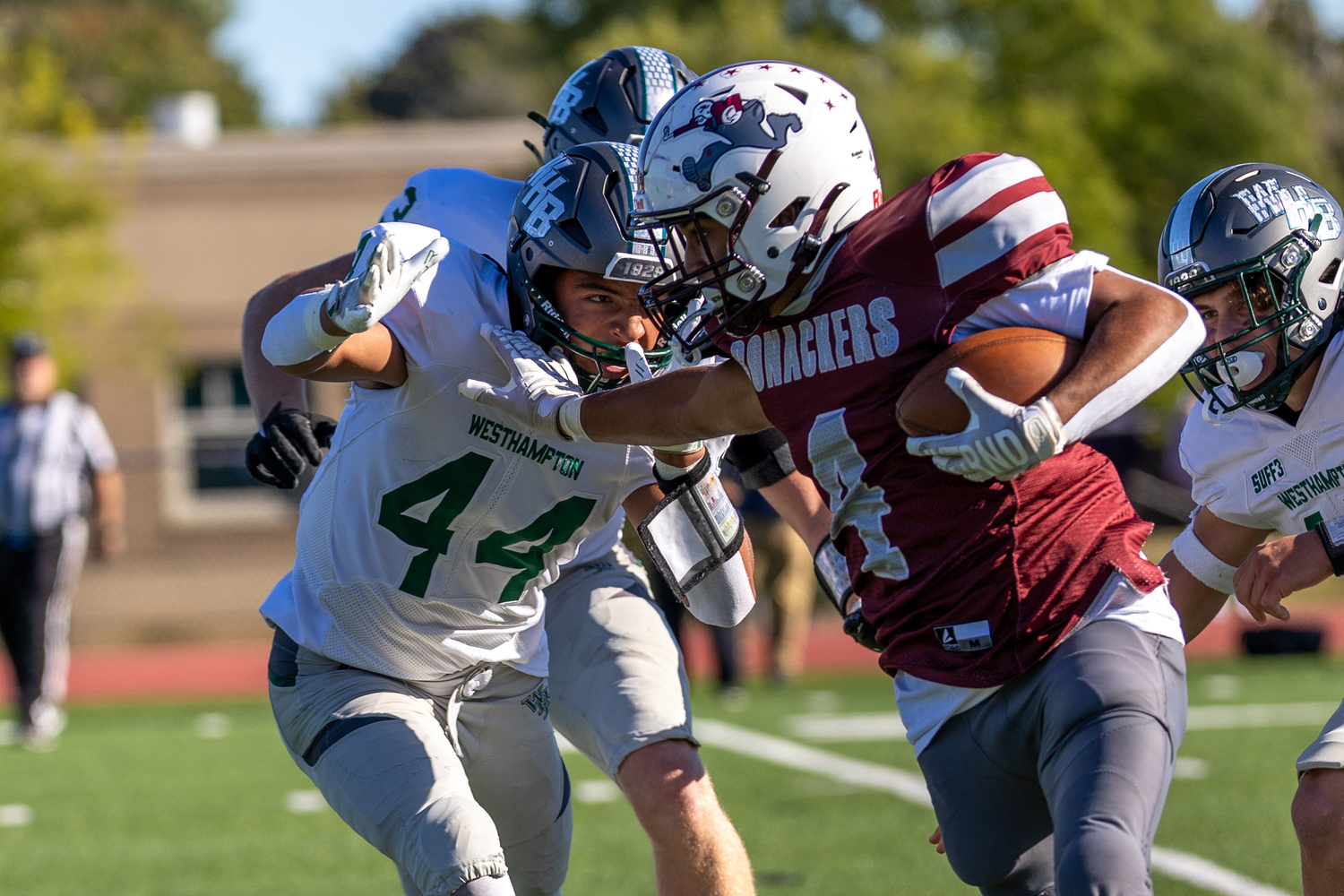 Bridgehampton junior Alex Davis tries to fend off Westhampton Beach senior Zach Arrasate.  RON ESPOSITO