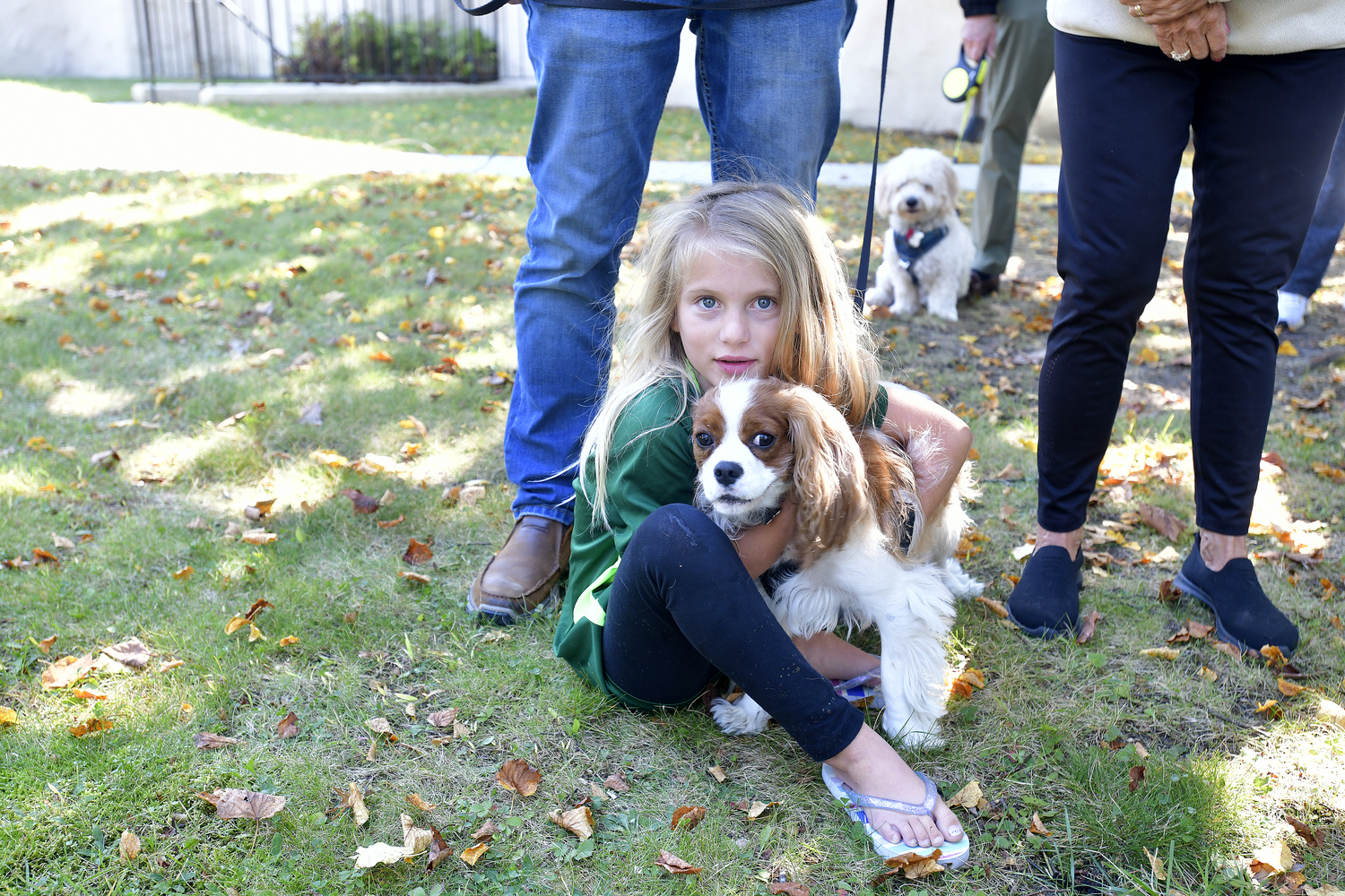 Elise Rose with Rosie at St. Mary's Episcopal Church in Hampton Bays on Saturday to honor St. Francis with the Blessing of the Animals. The Rev. Justin A. Falciani, Rector, performed the blessings.  DANA SHAW