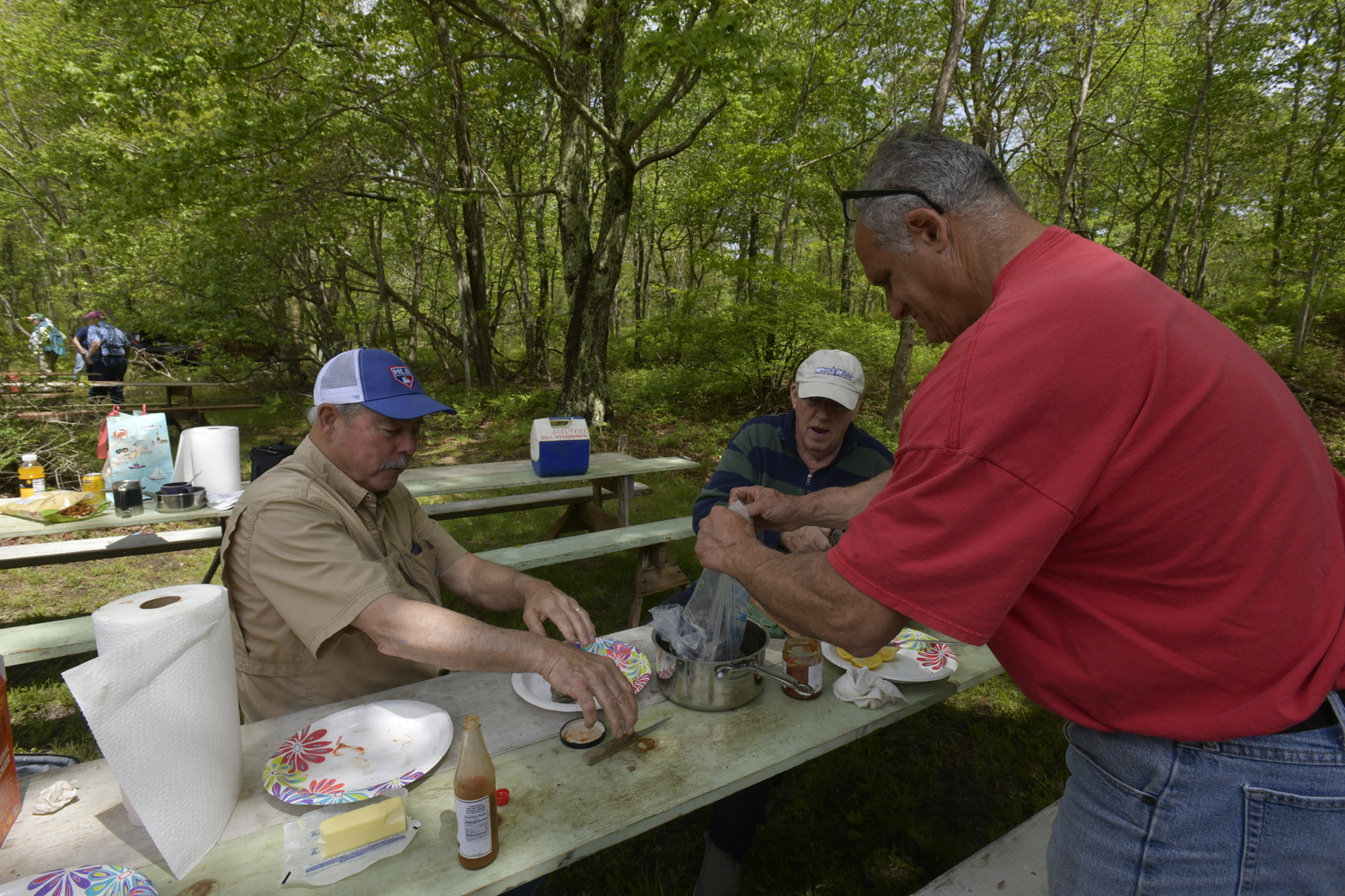 Members of the  Hunters Garden Association gather in May. DANA SHAW