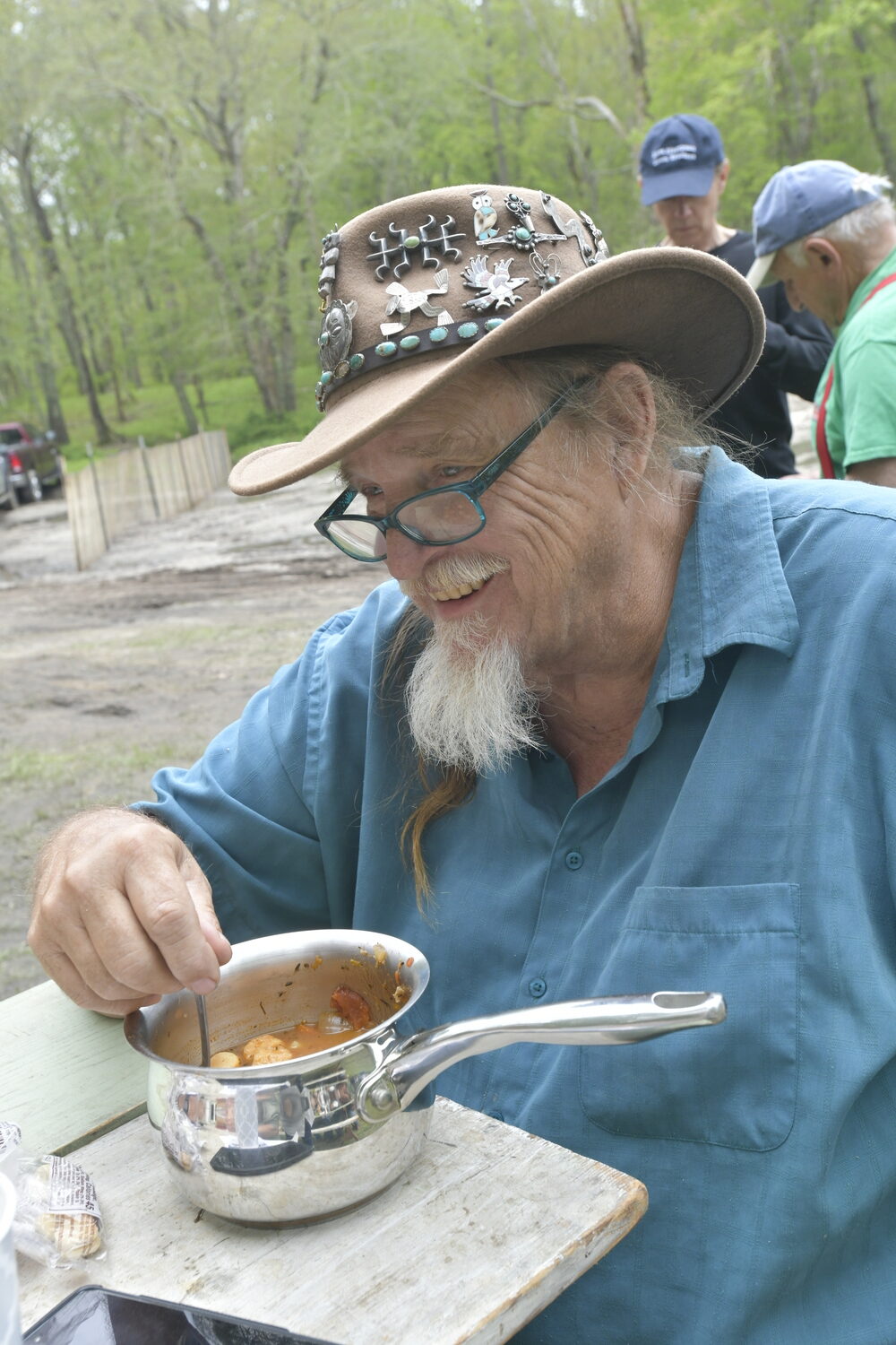 Visitors to the Hunter's Garden sample eel and Manhattan clam chowders cooked in large pots on the site.   DANA SHAW