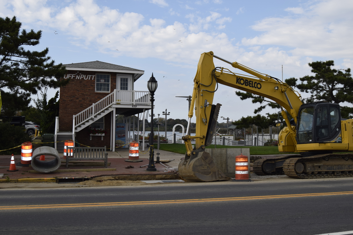 The state Department of Transportation's stormwater drainage improvement project in Montauk's downtown does not go far enough to mitigate degraded water quality in Fort Pond, Concerned Citizens of Montauk say. CHRISTOPHER WALSH