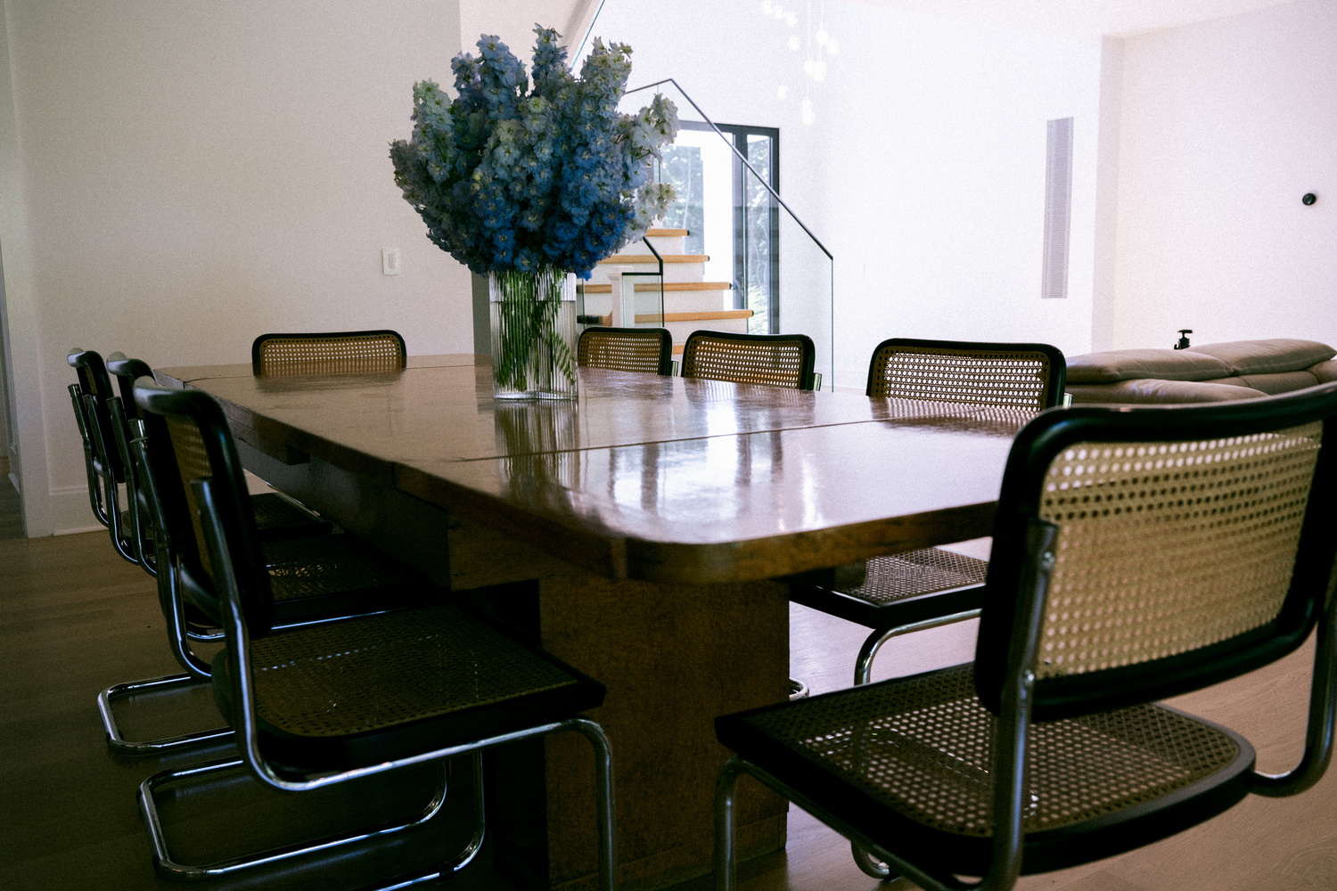 The inviting dining room table is made to entertain.  MACRAE MARRAN