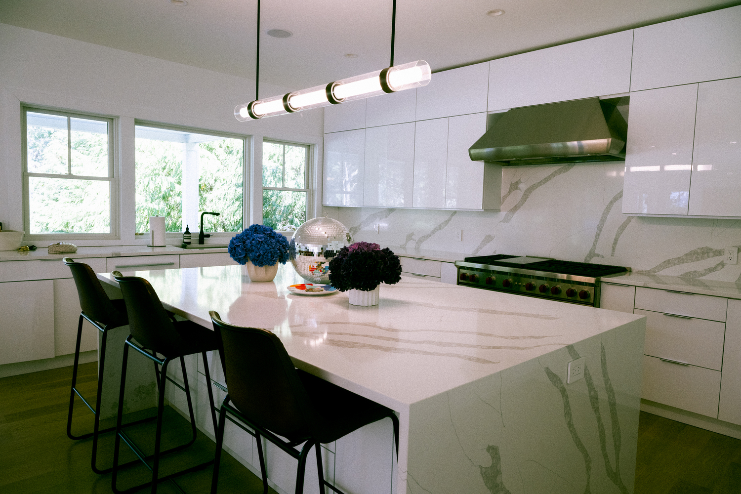 The kitchen summons sleek, clean and refined design.  MACRAE MARRAN