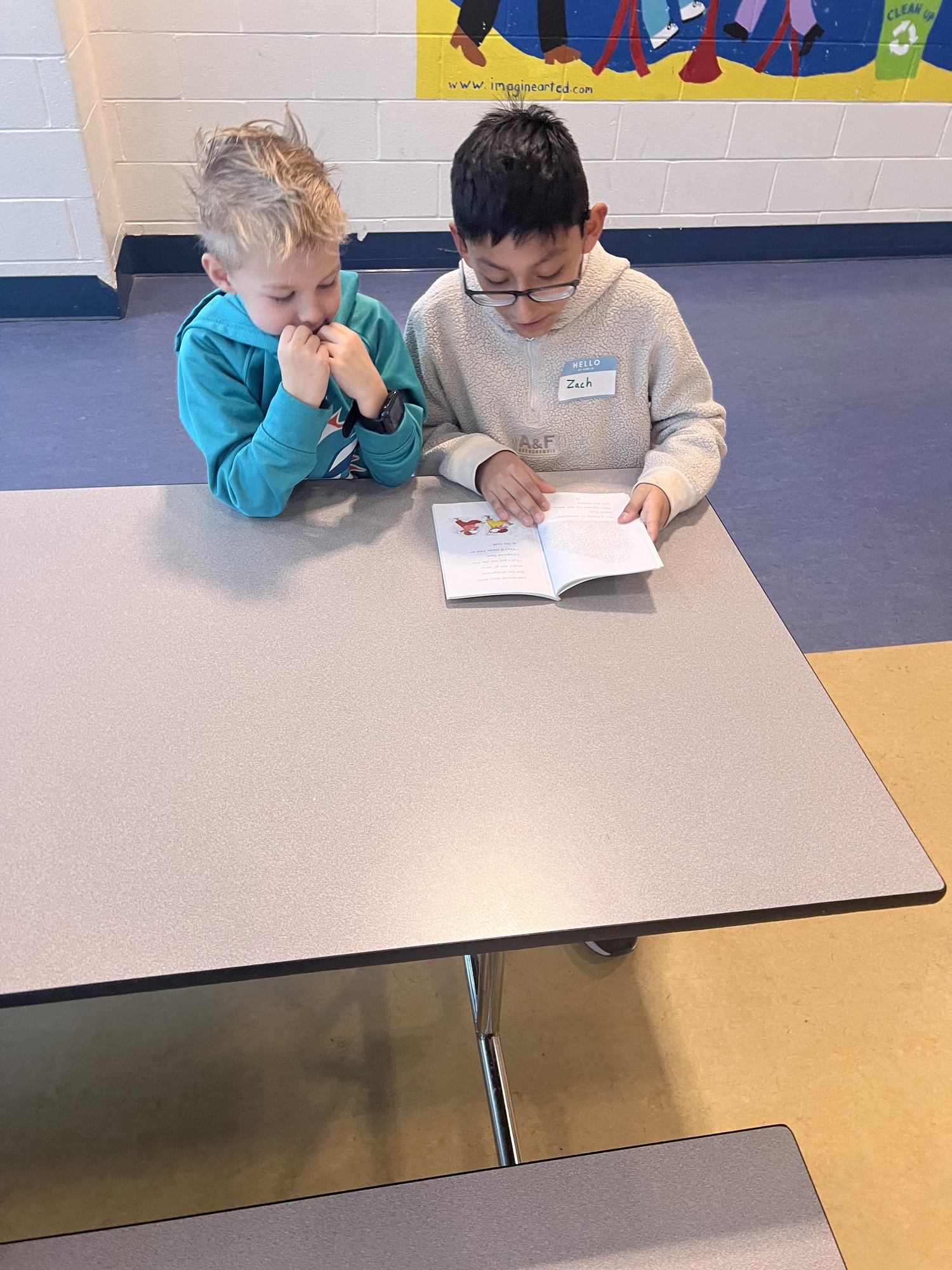 Ben Gordon and Zach Vasquez, students at John M. Marshall Elementary School, work together in the East Hampton district's dual language program. COURTESY KAREN KUNETH