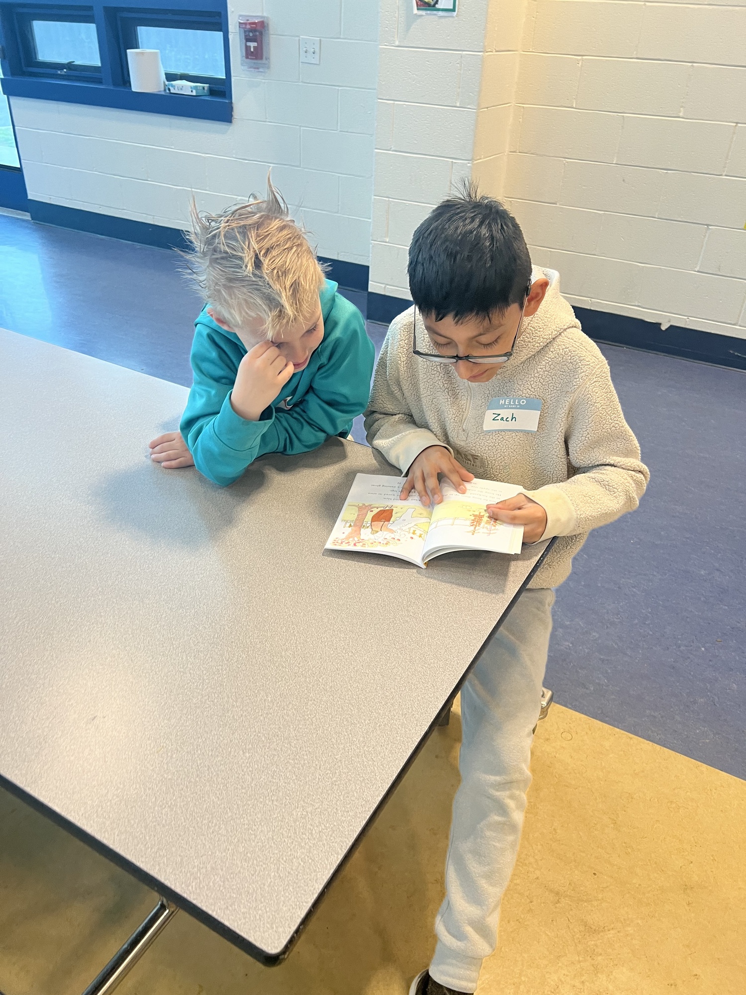 Ben Gordon and Zach Vasquez, students at John M. Marshall Elementary School, work together in the East Hampton district's dual language program. COURTESY KAREN KUNETH