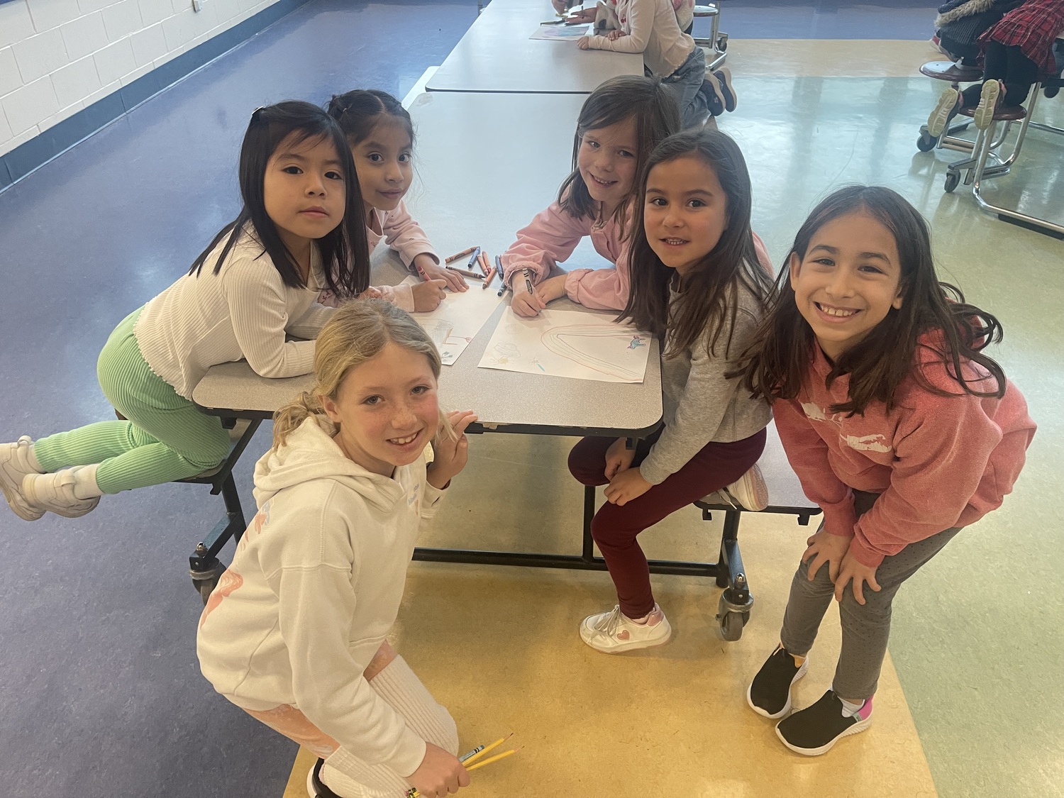 Isla Haak, Sofia Morocho, Scarlett Bergara, Allegra Burns, Amara Maldonado and Lucia Limonious, students at John M. Marshall Elementary School, work together in the East Hampton district's dual language program. COURTESY KAREN KUNETH