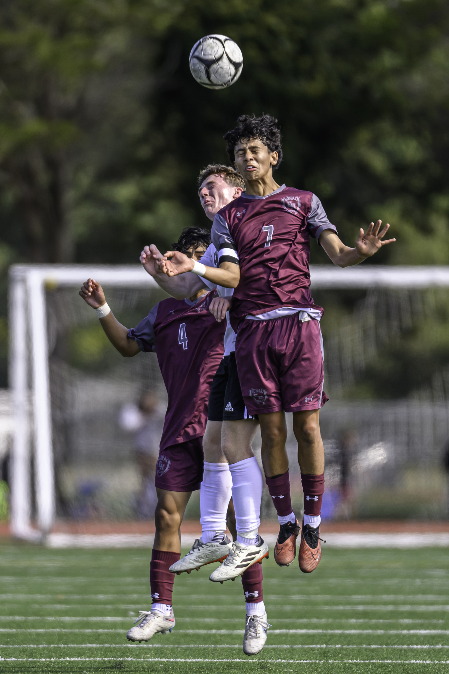 Senior forward Ariel Garcia gets his head on the ball. MARIANNE BARNETT