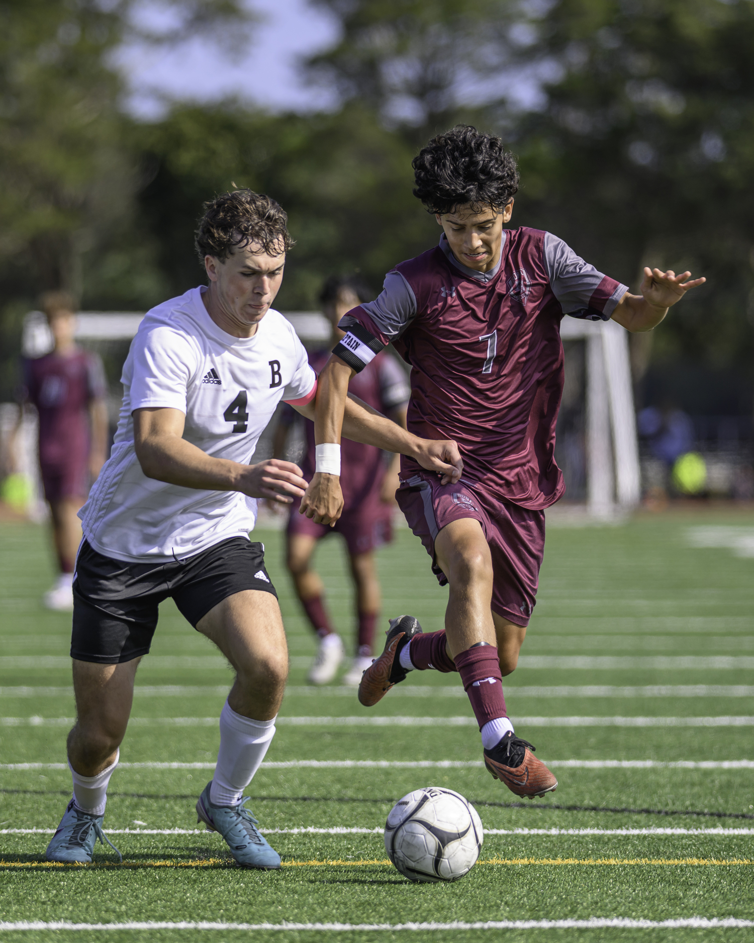 Senior forward Ariel Garcia battles for possession. MARIANNE BARNETT