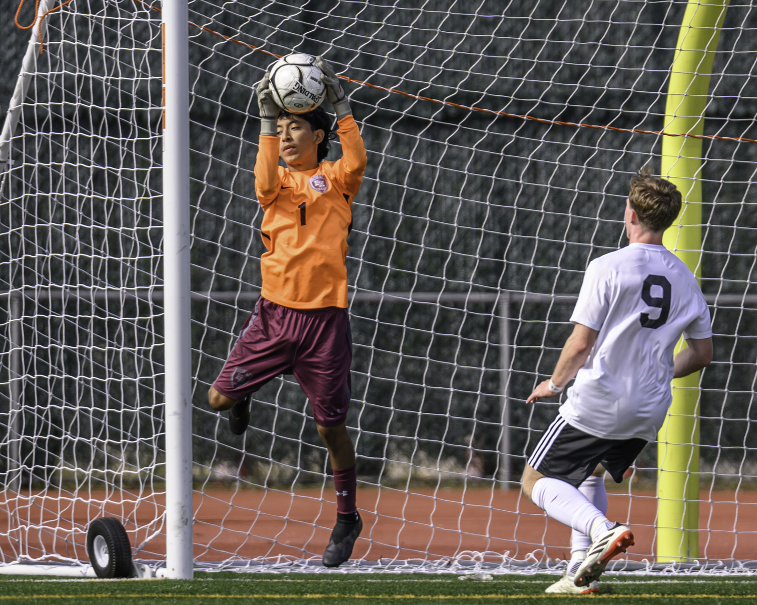 Sophomore goalkeeper Brandon Encalada makes a save. MARIANNE BARNETT