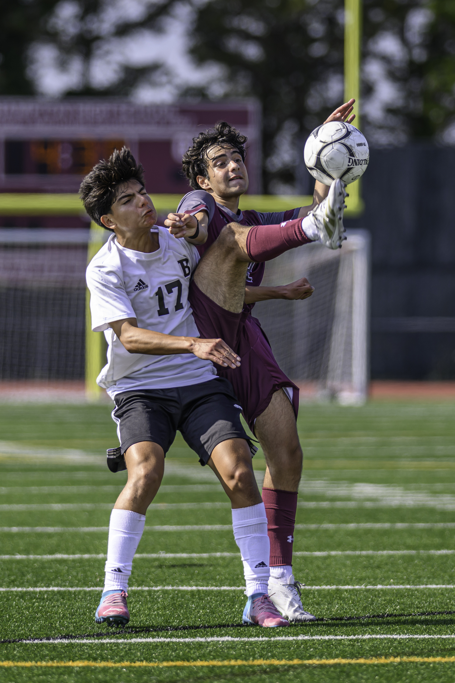 Senior forward Diego Duke reaches for the ball. MARIANNE BARNETT