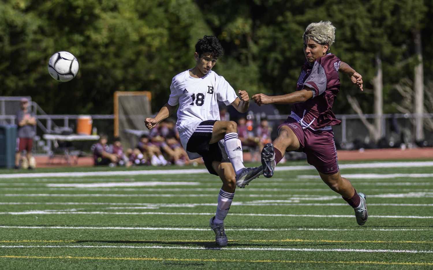 Senior forward Juan Salcedo sends a pass downfield. MARIANNE BARNETT