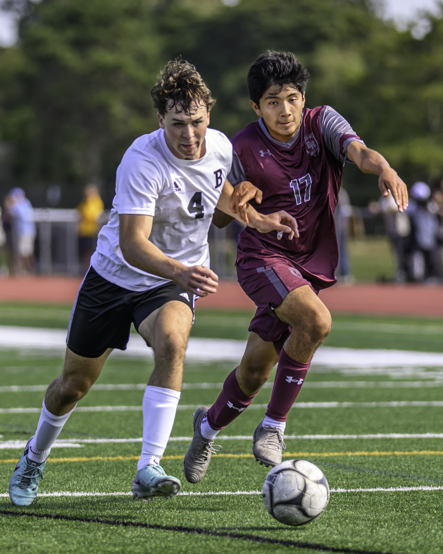 Junior midfielder Sean Perez maintains possession with a defender on his hip. MARIANNE BARNETT