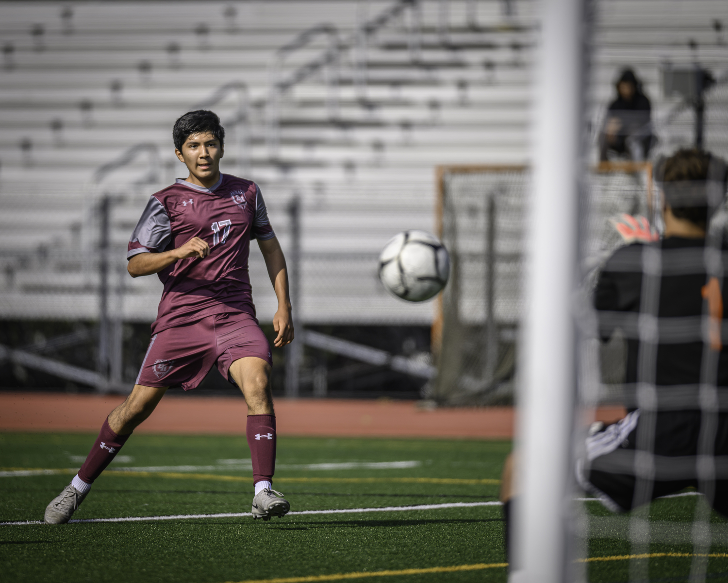 Junior midfielder Sean Perez shoots. MARIANNE BARNETT