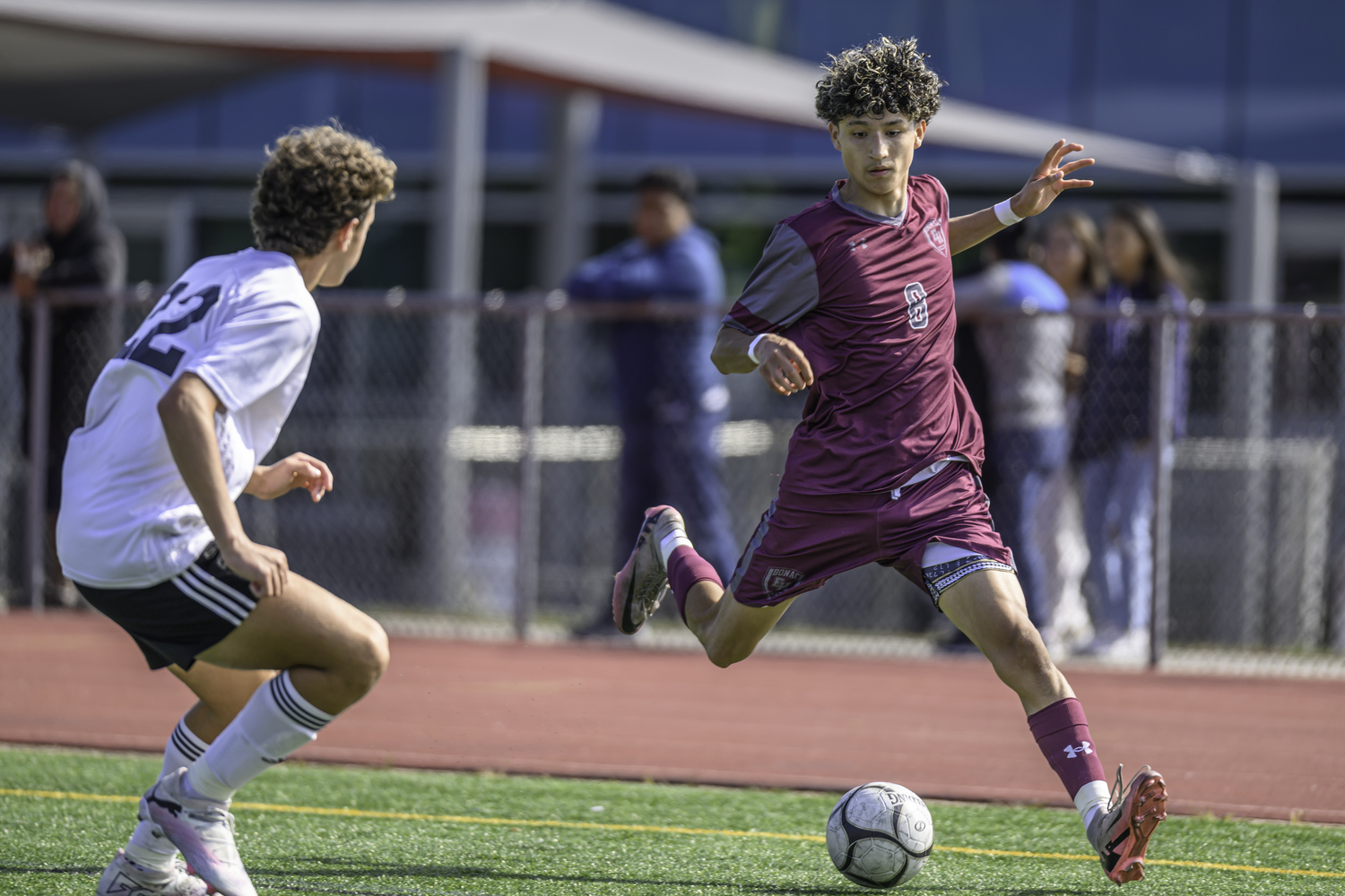 Junior forward Yandell Parra moves the ball down the sideline. MARIANNE BARNETT