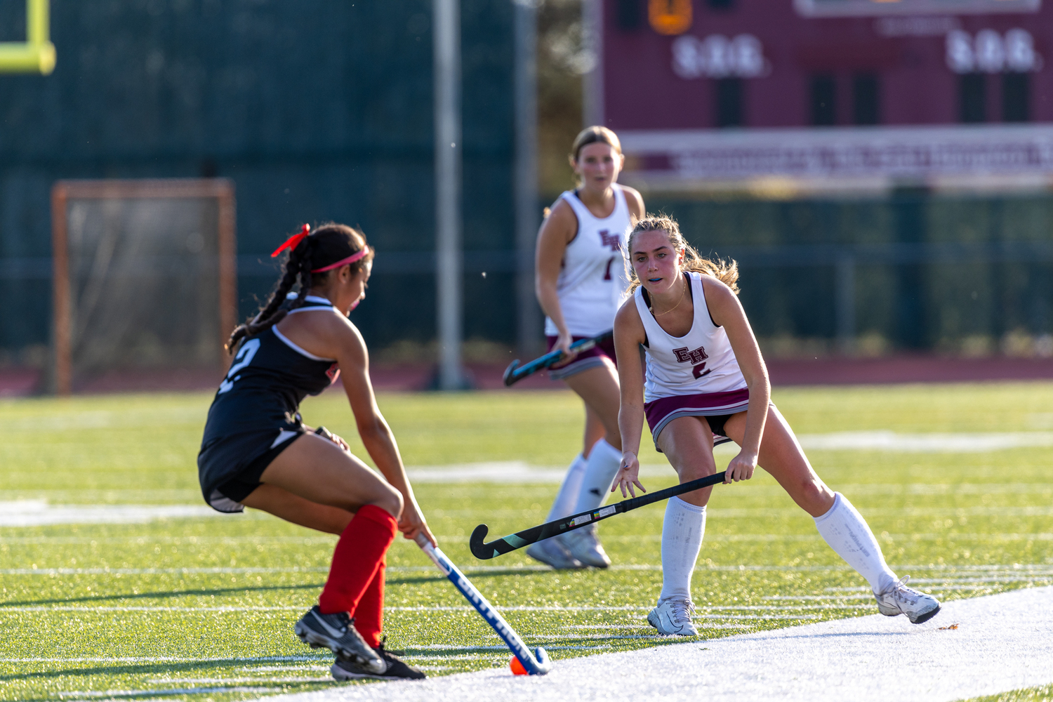 East Hampton junior Cassandra Ceva looks to stop an East Islip player.   RON ESPOSITO