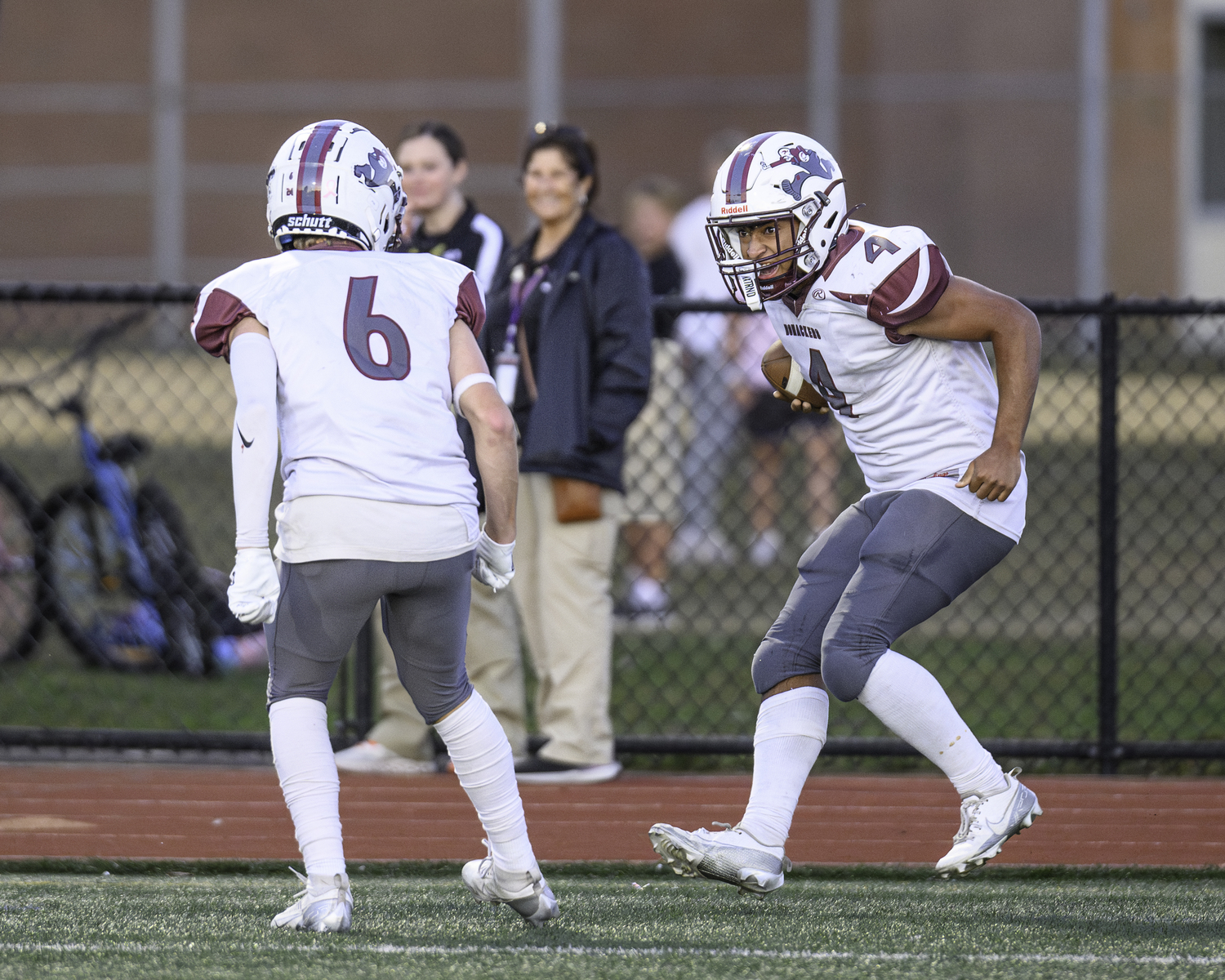 Alex Davis prepares to celebrate with teammate Cole Dunchick after his score.   MARIANNE BARNETT