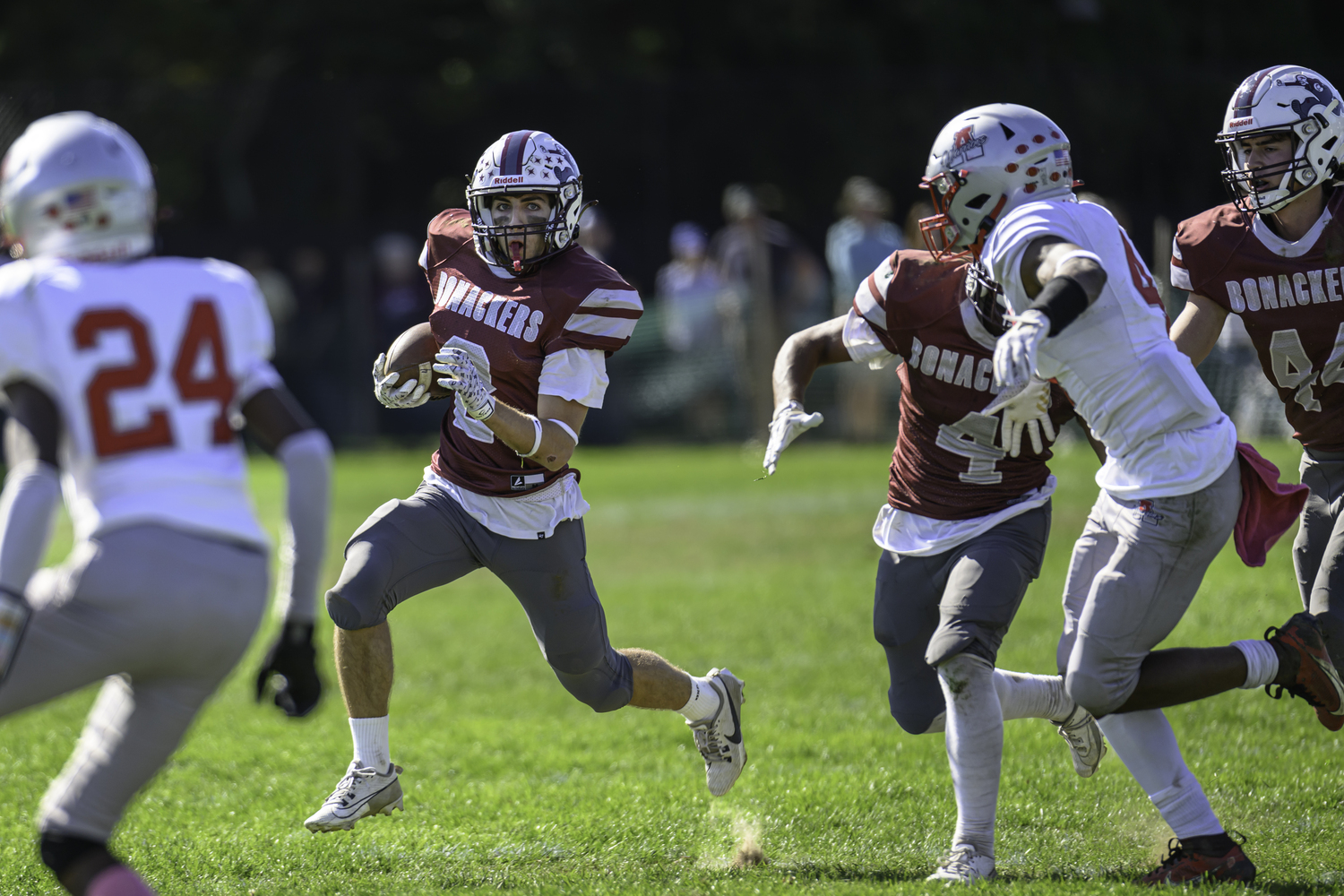 Pierson senior Henry Butler has some blockers in front on a run.   MARIANNE BARNETT