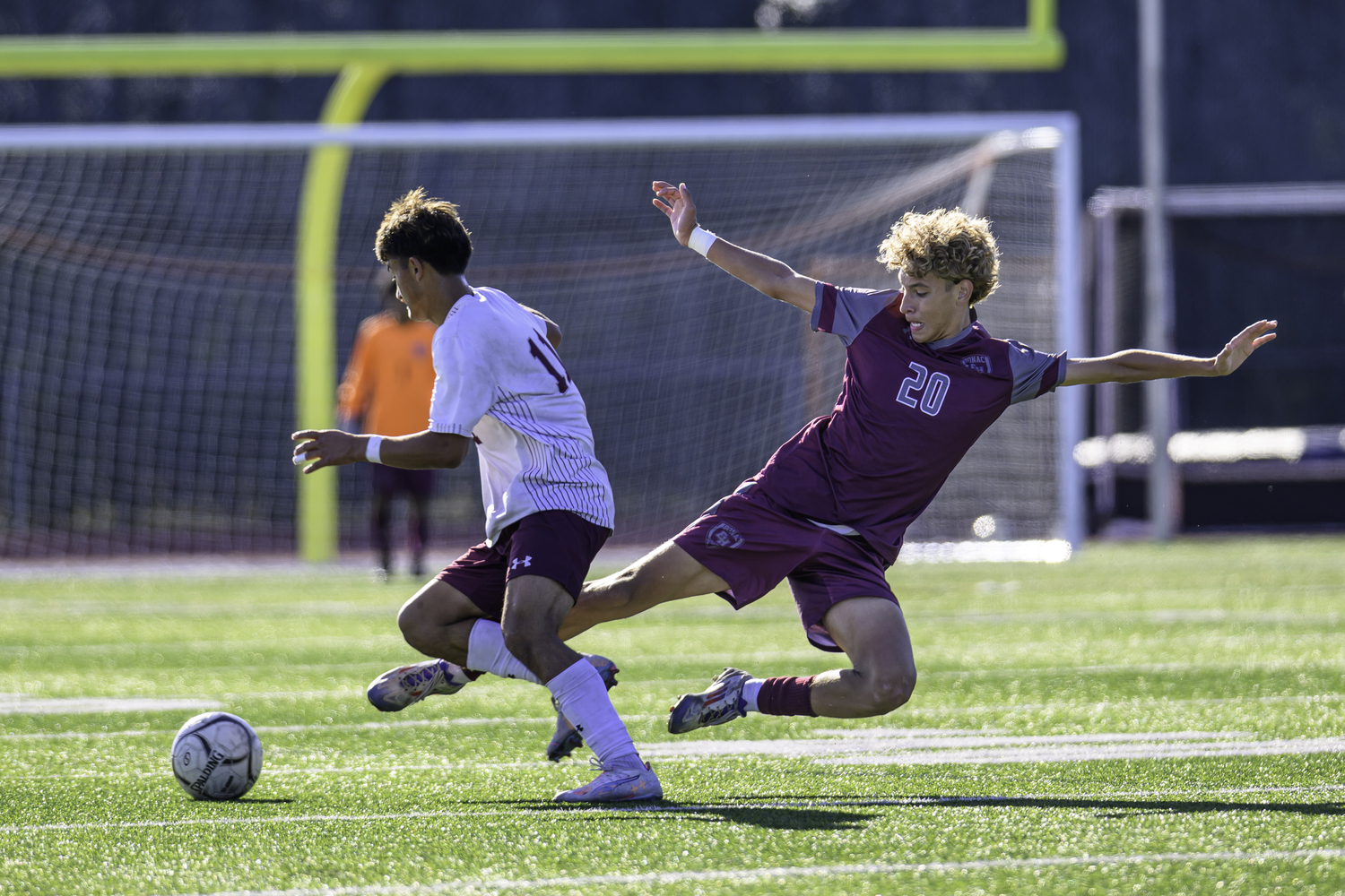 East Hampton sophomore Esteban Diaz tries to stop Deer Park senior Jose Escobar.   MARIANNE BARNETT