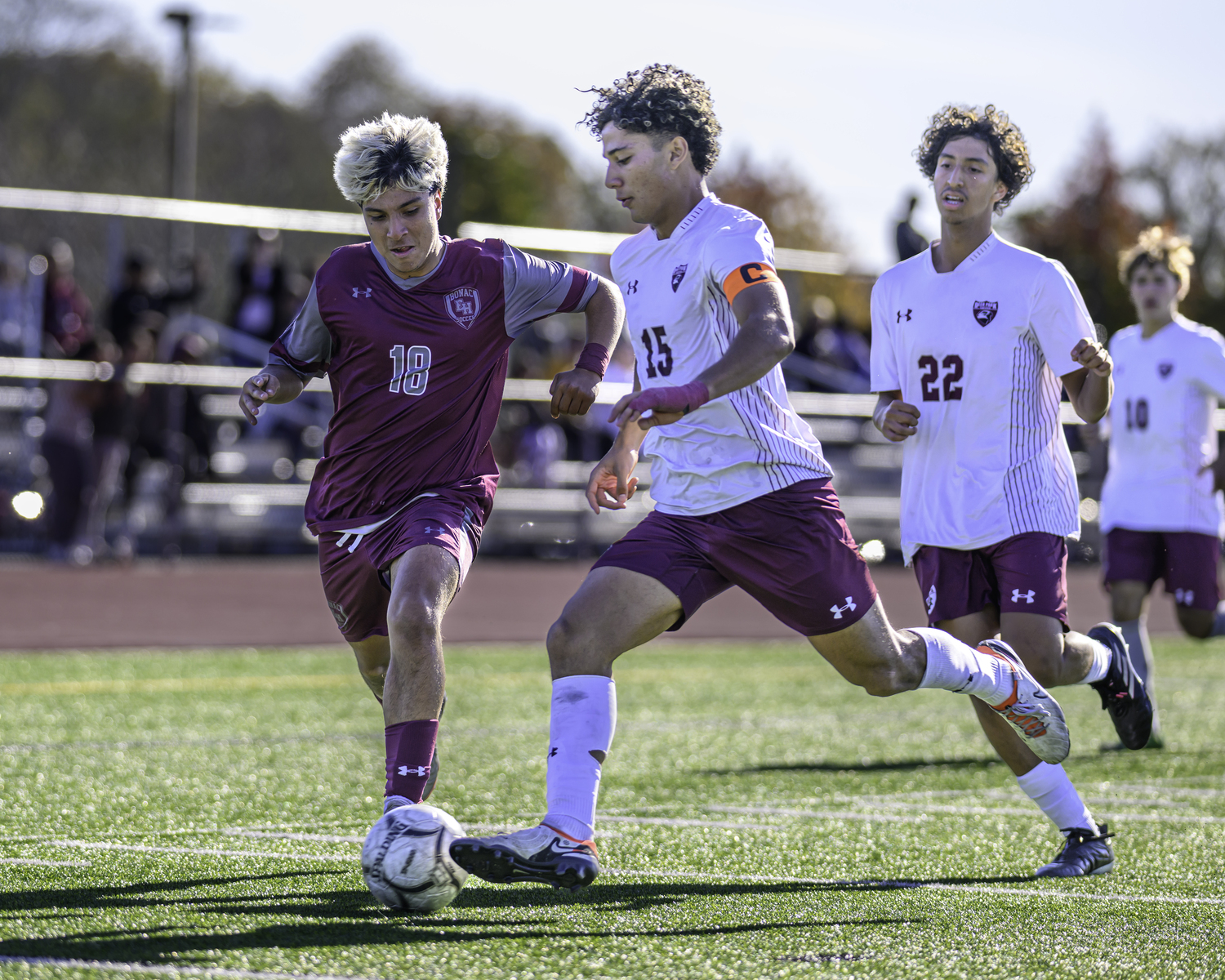 East Hampton senior Juan Salcedo tries to break into the Falcon's defensive third.  MARIANNE BARNETT