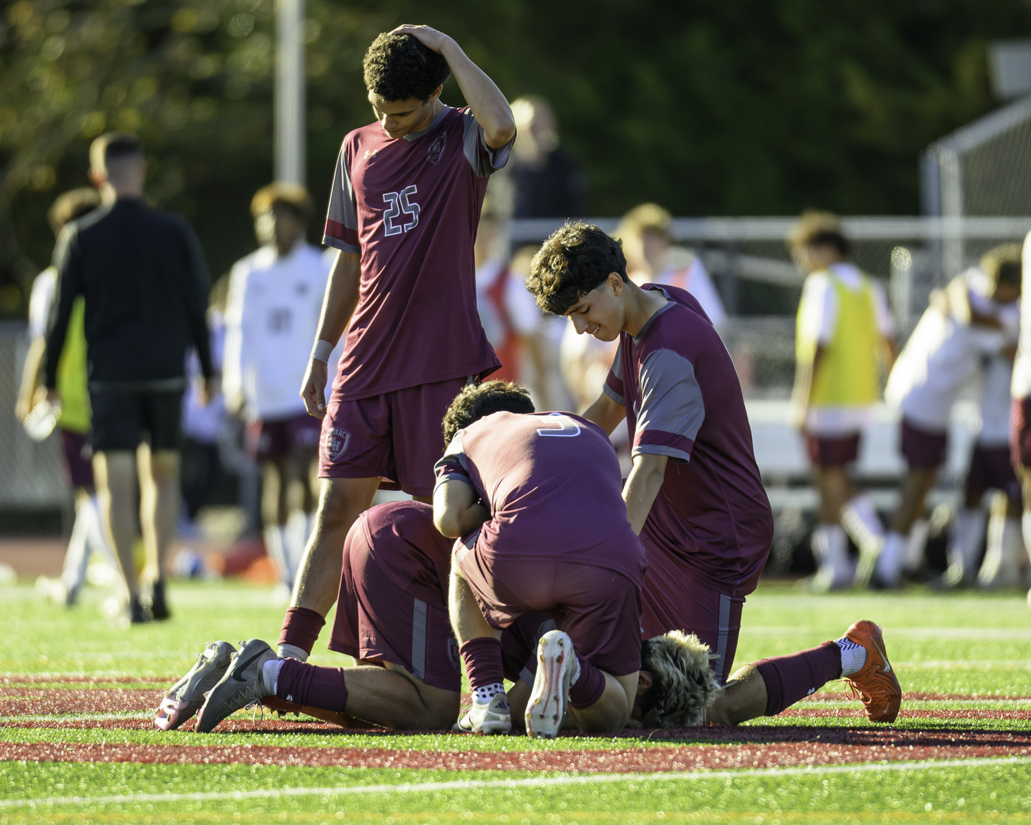 The Bonackers pick each other up after a tough 2-1 loss to Deer Parking in the opening round of the playoffs on Saturday.   MARIANNE BARNETT